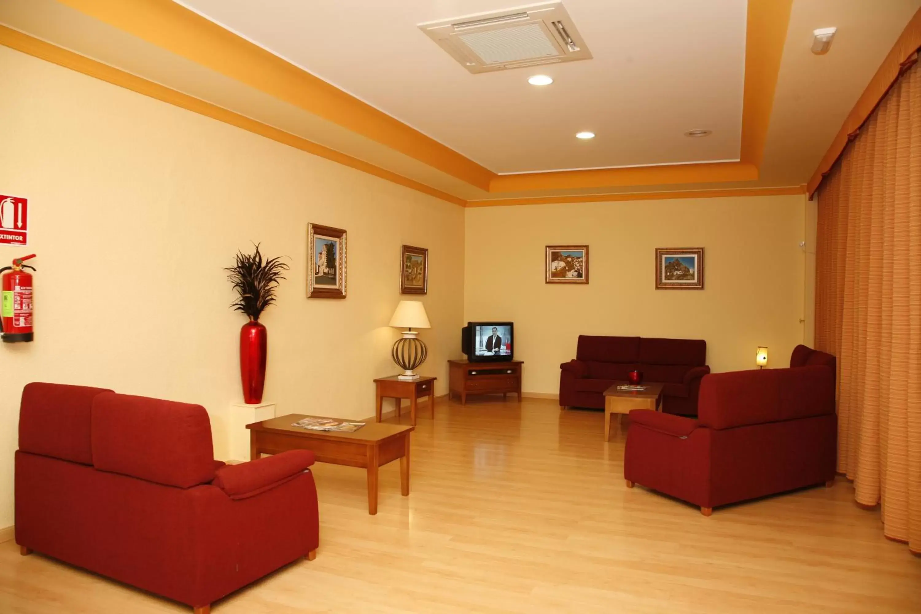 Communal lounge/ TV room, Seating Area in Hotel Mari Carmen
