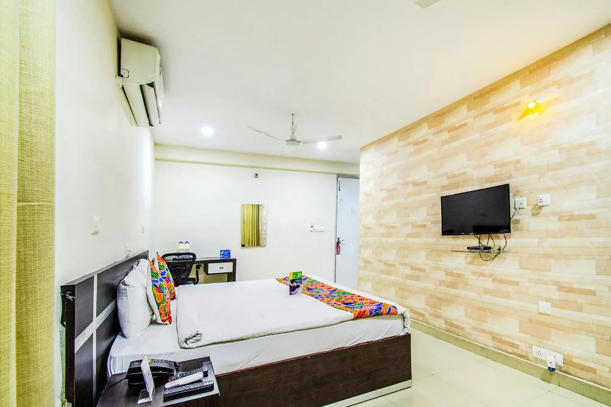 Bed in FabHotel Pride Inn - Nr TCS Deccan Park, Hitech City Bed in FabHotel Pride Inn - Nr TCS Deccan Park, Hitech City