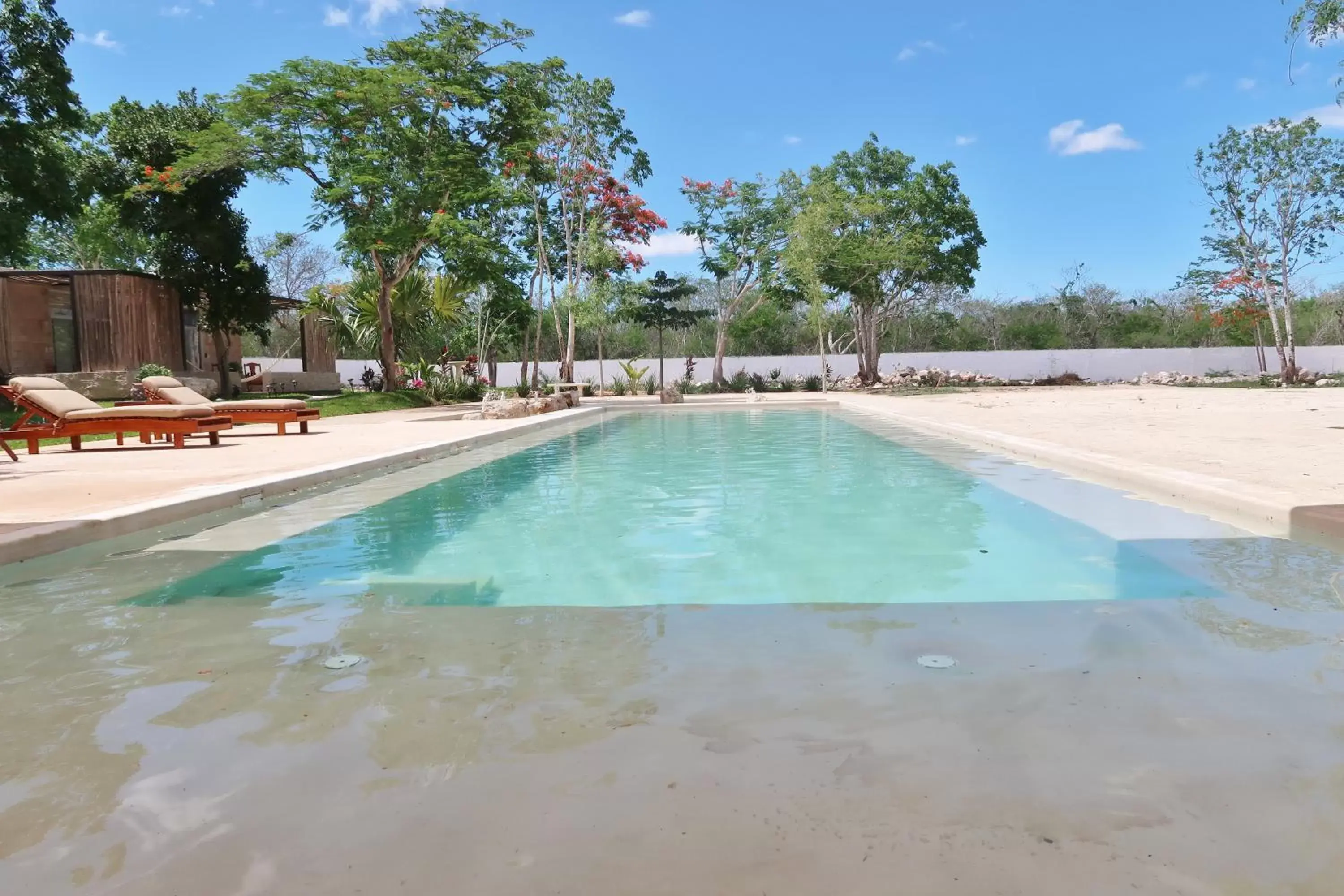 Property building, Swimming Pool in Hotel Casa de Campo Conkal Merida