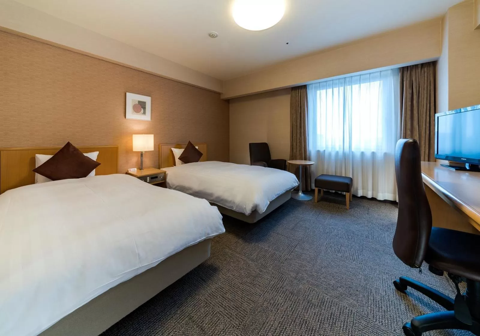 Bed in Daiwa Roynet Hotel Akita