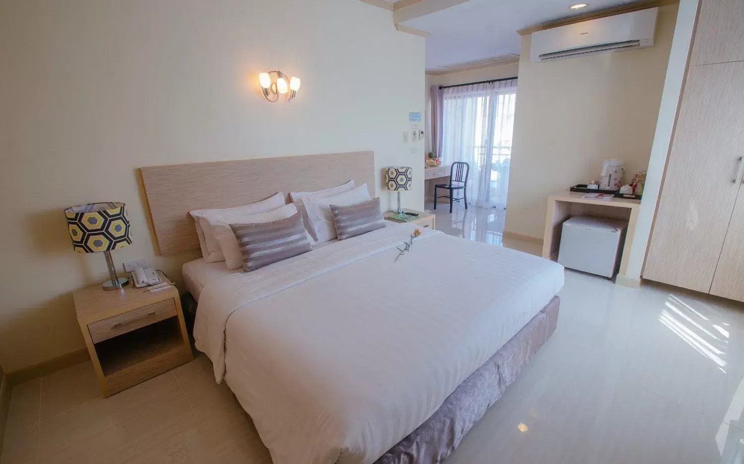 Bed in Thipurai City Hotel