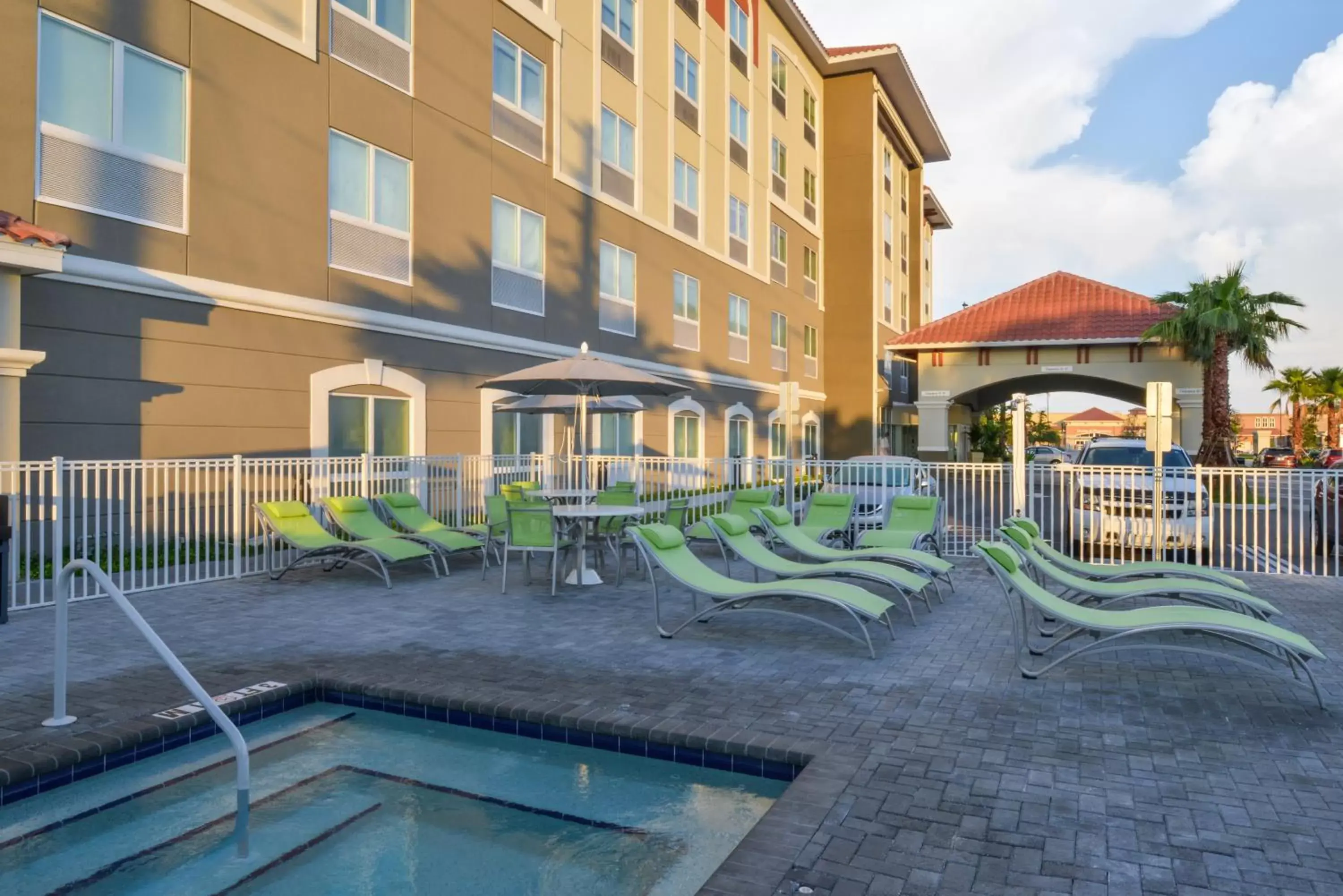 Swimming pool, Property Building in Holiday Inn Express & Suites - St. Petersburg - Madeira Beach, an IHG Hotel