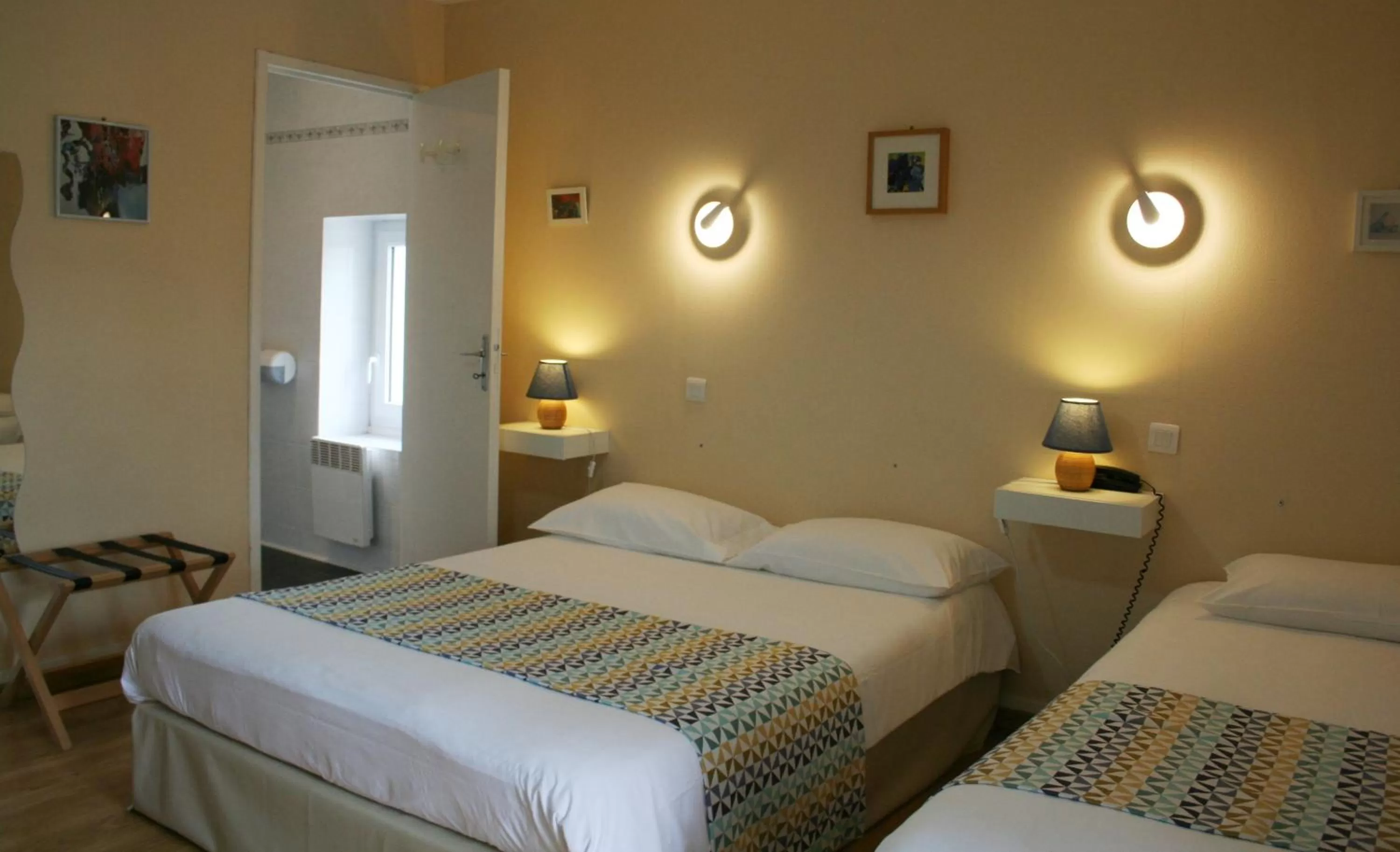 Photo of the whole room, Bed in Logis Hôtel Le Cygne