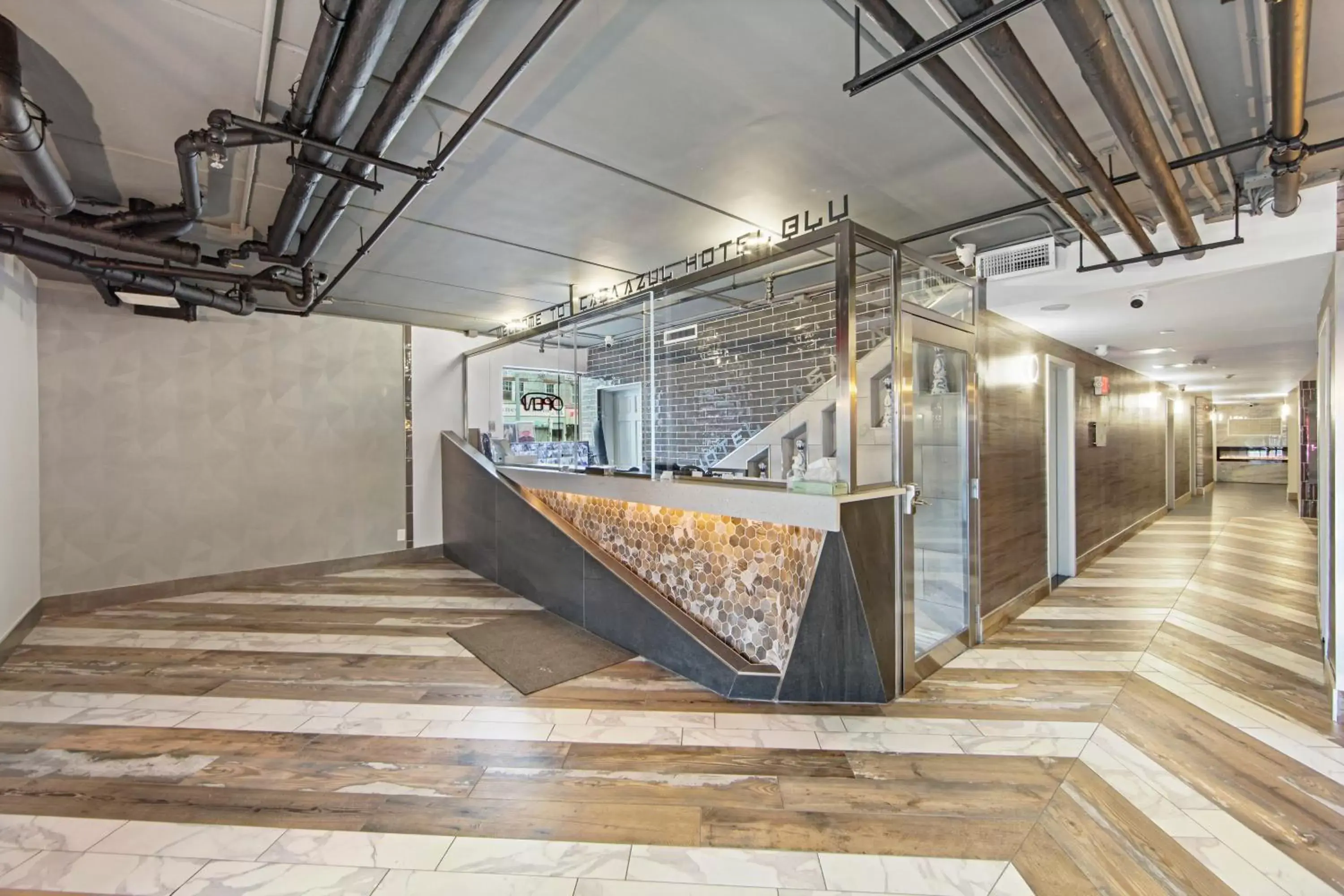 Lobby or reception in Casa Azul Hotel Blu-UBS Arena Lobby or reception in Casa Azul Hotel Blu-UBS Arena