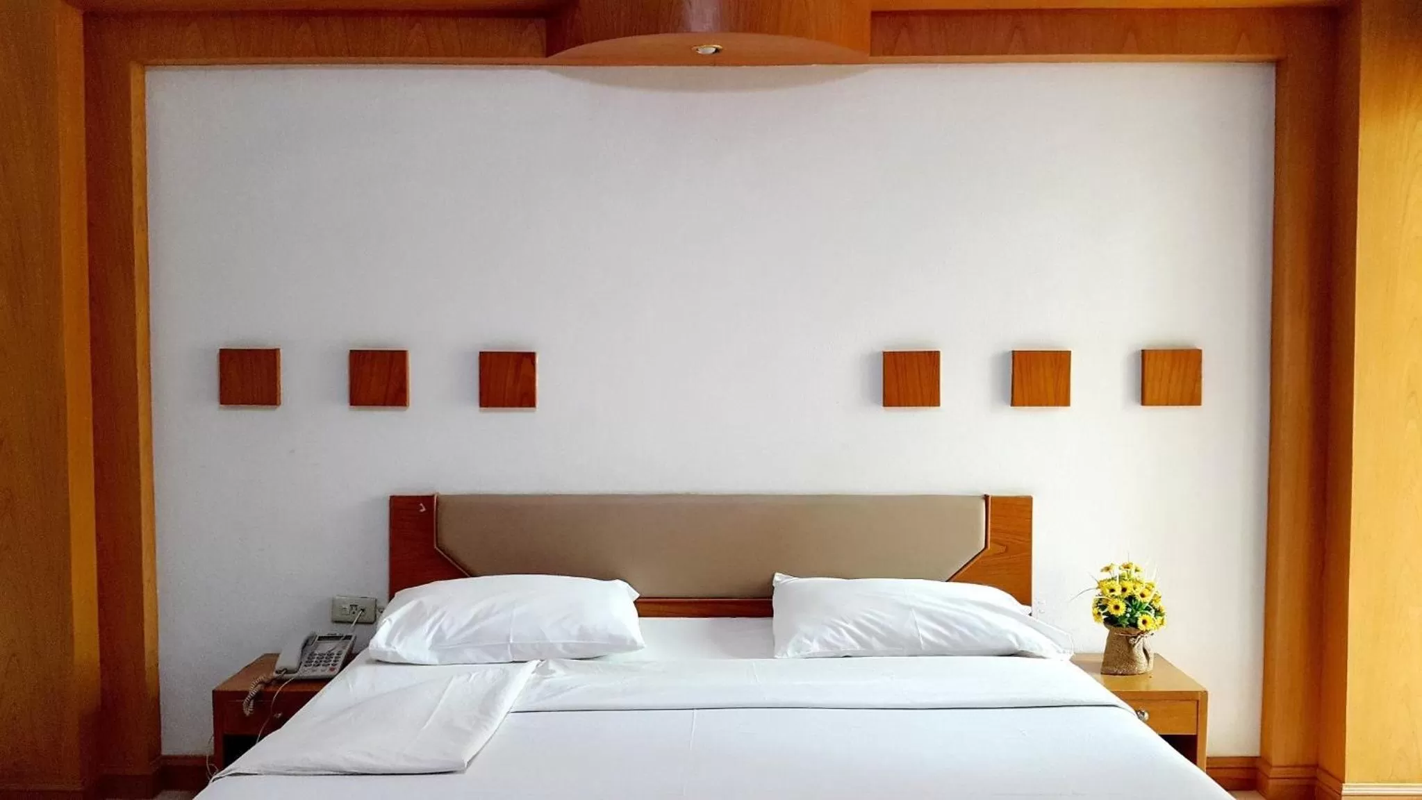 Bed in Areena Resort and Hotel Uttaradit