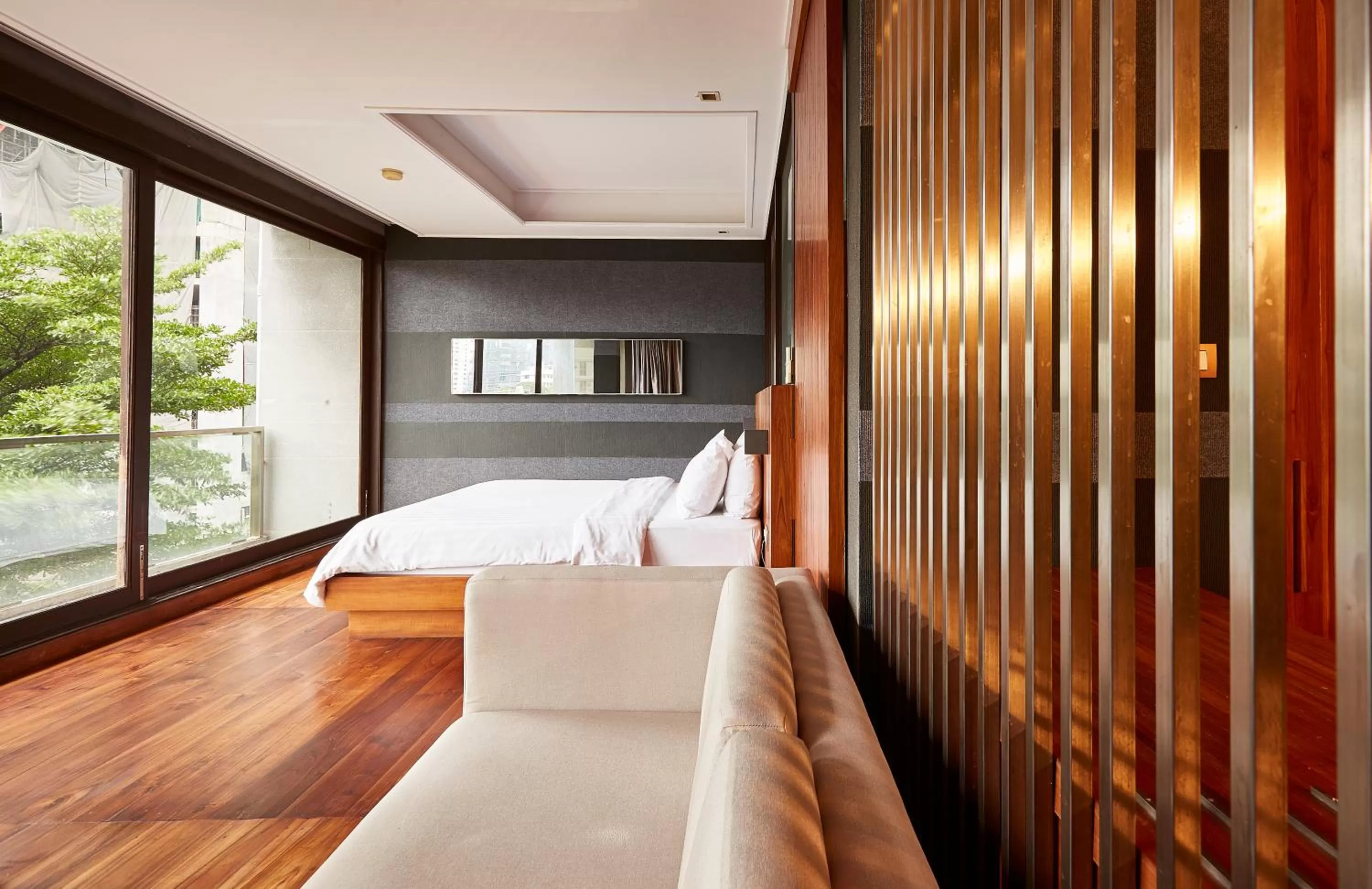 Bed in LUXX Langsuan Hotel - SHA Plus