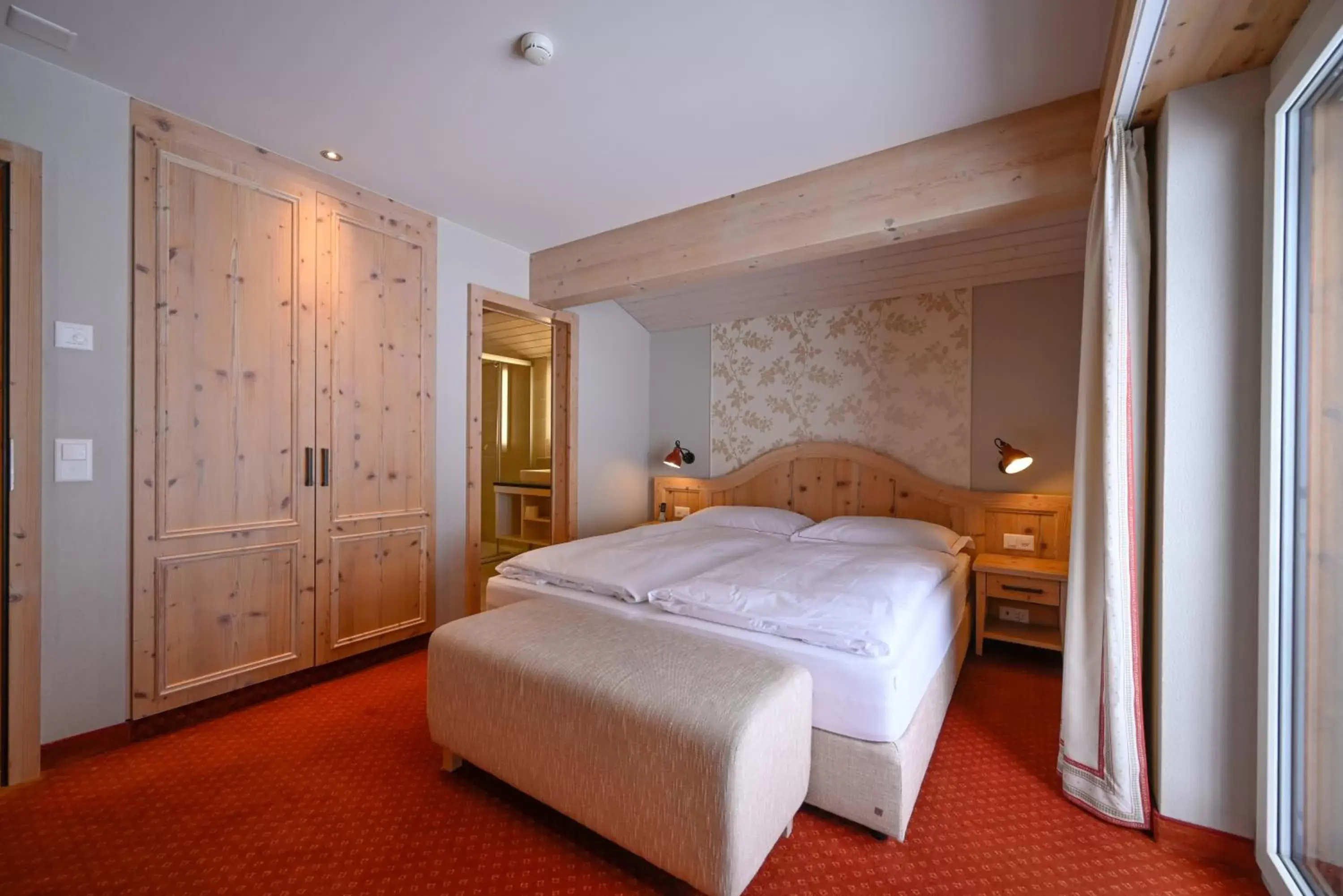 Bedroom, Bed in Romantik Hotel Schweizerhof