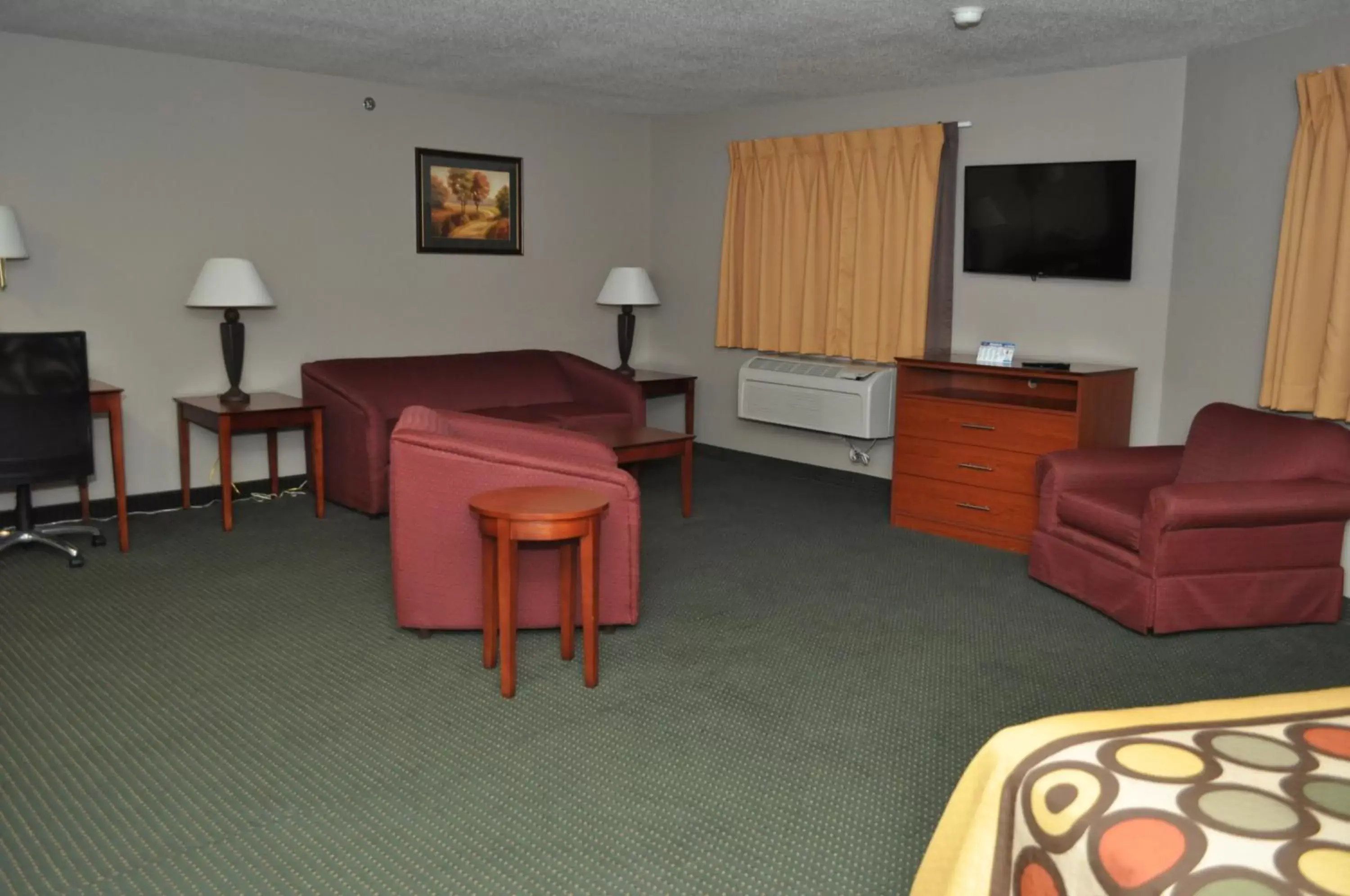 Seating Area in Super 8 by Wyndham Clearfield