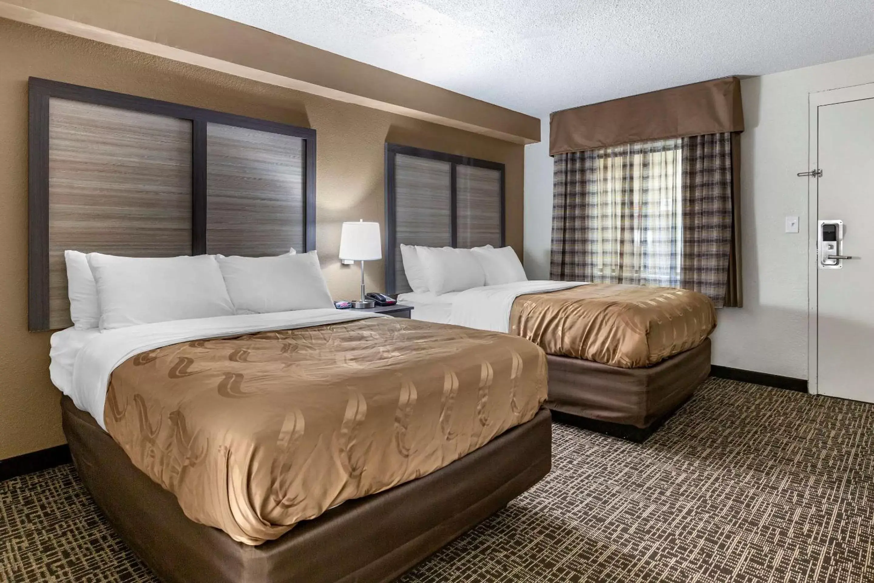 Photo of the whole room, Bed in Quality Inn & Suites Spring Lake - Fayetteville Near Fort Liberty