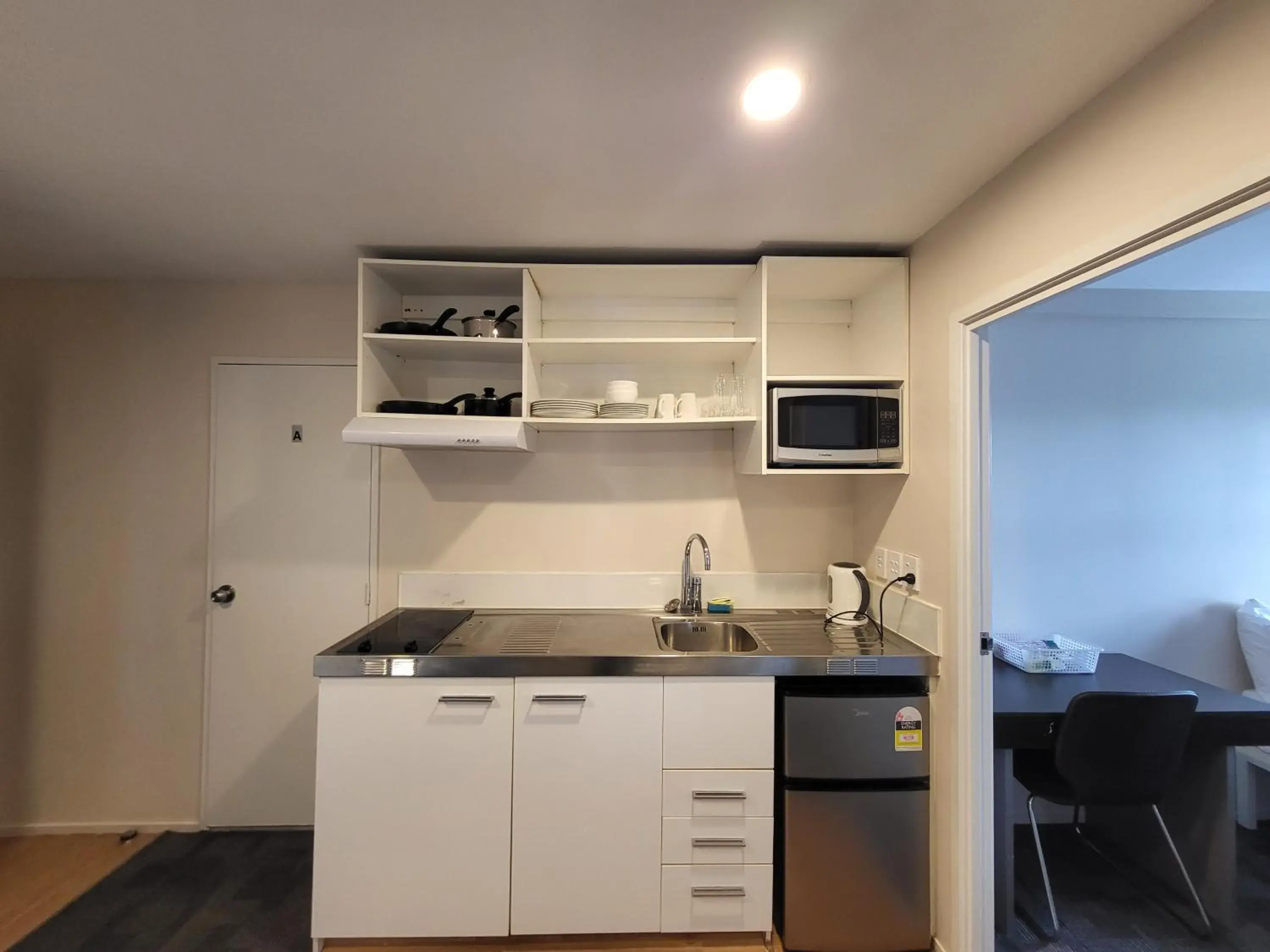 Kitchen/Kitchenette in Empire Apartments