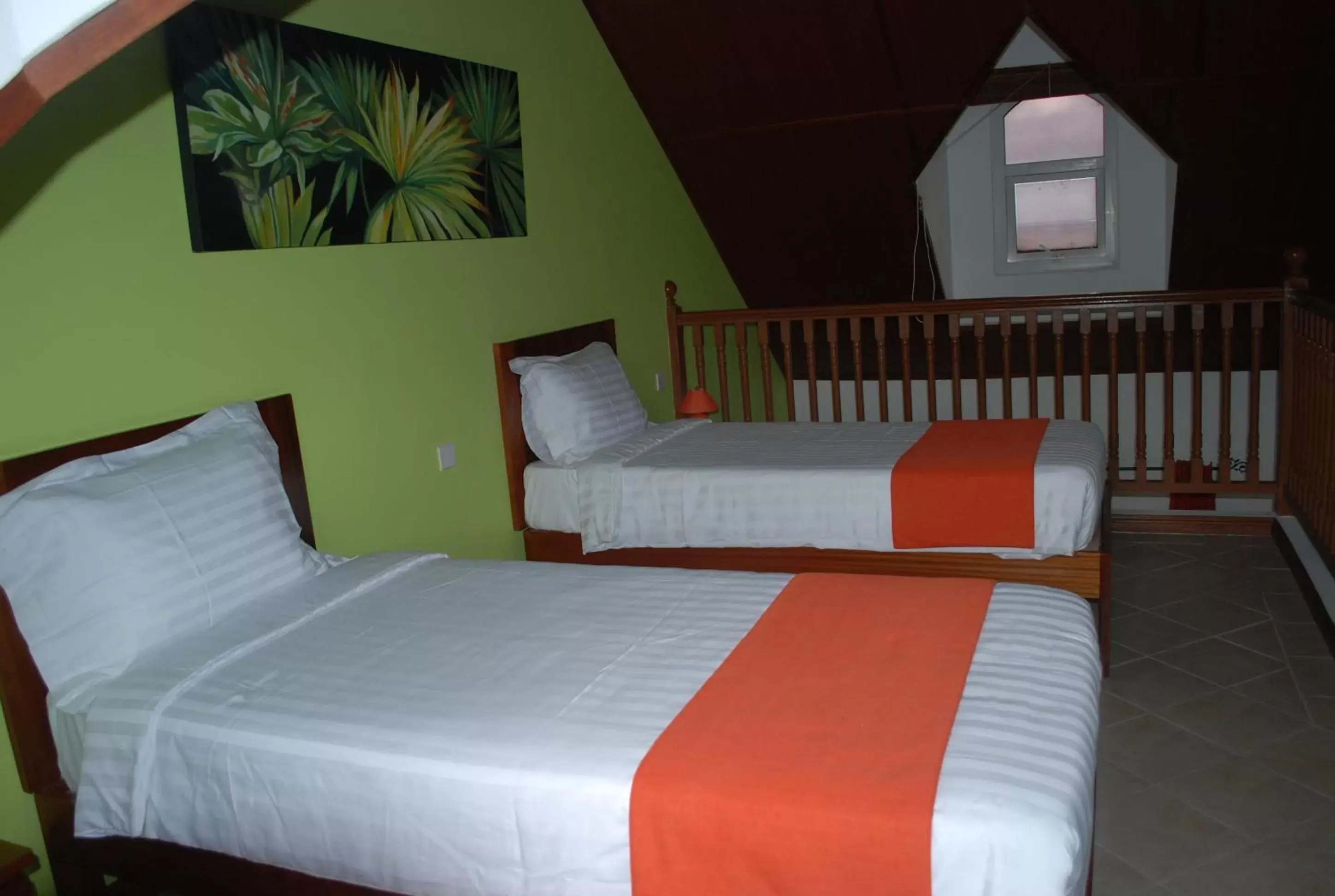 Bed in Sunset Reef Resort & Spa