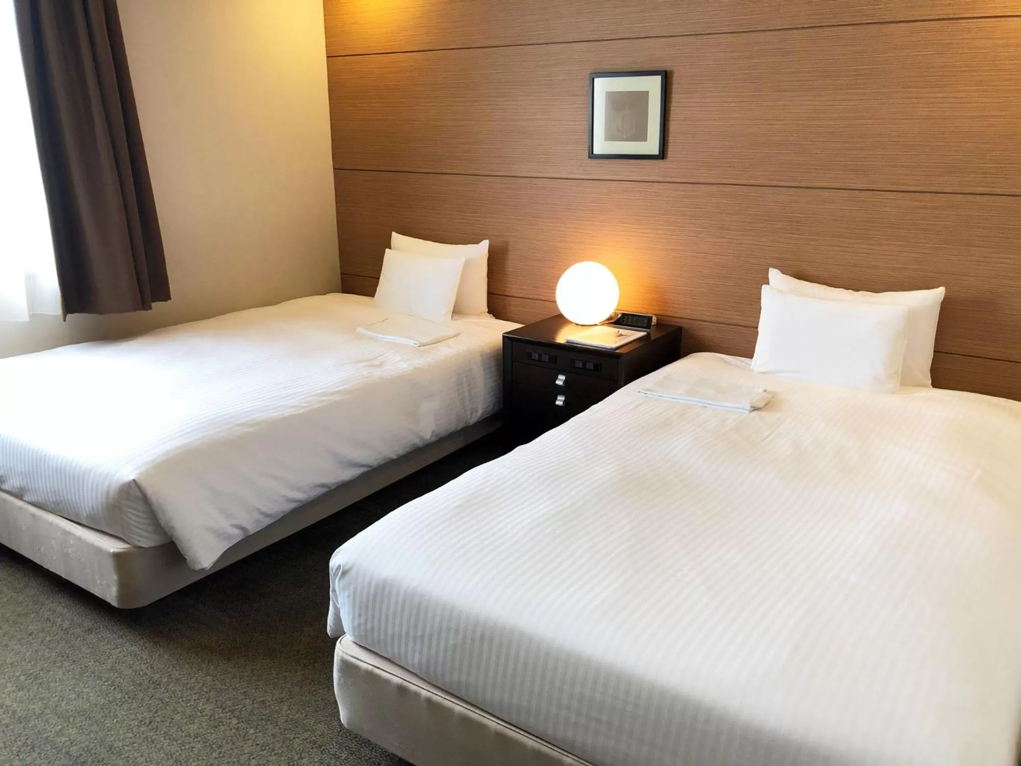 Bed in Citadines Central Shinjuku Tokyo