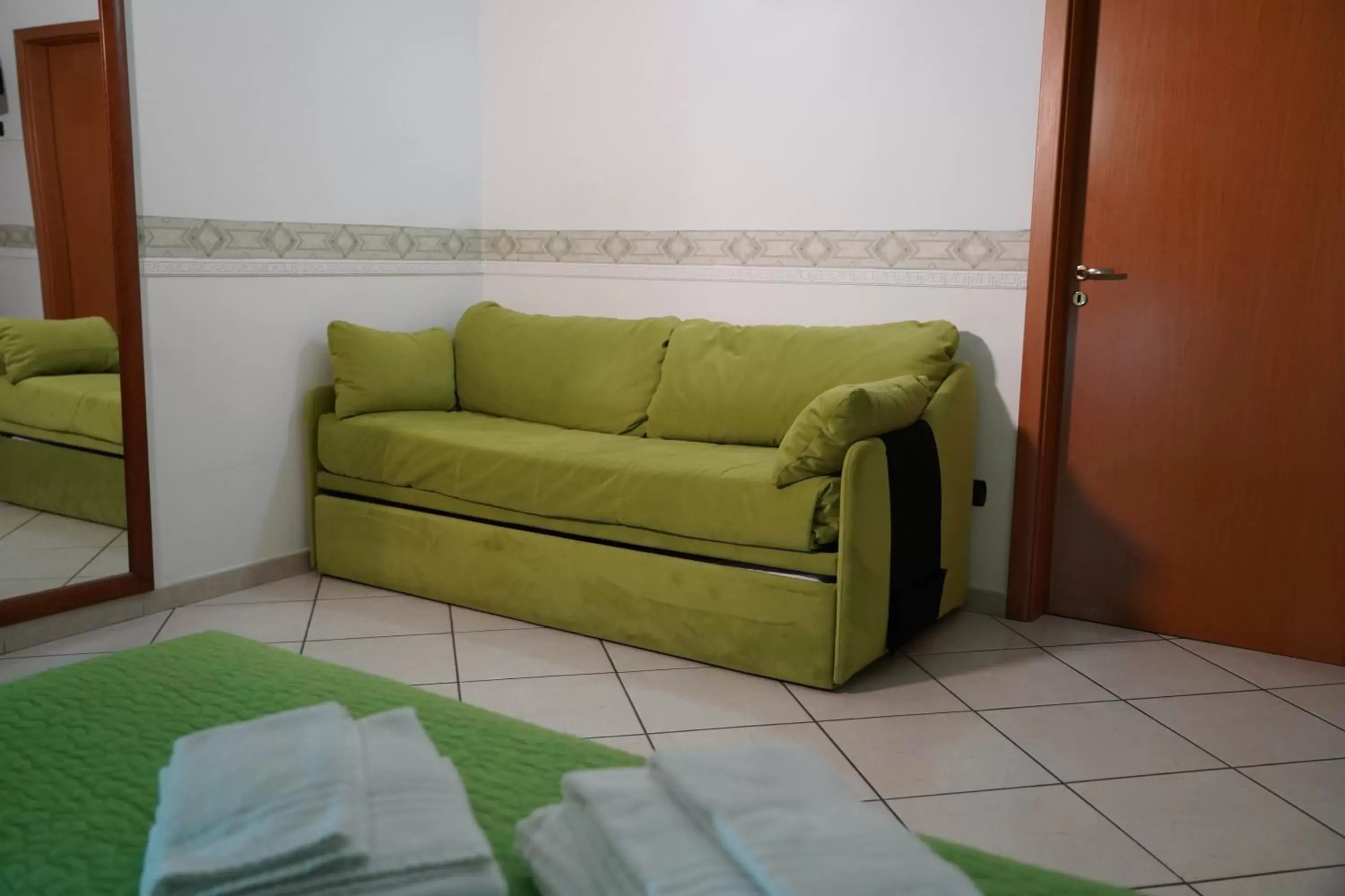 Bedroom, Seating Area in Villa Flora