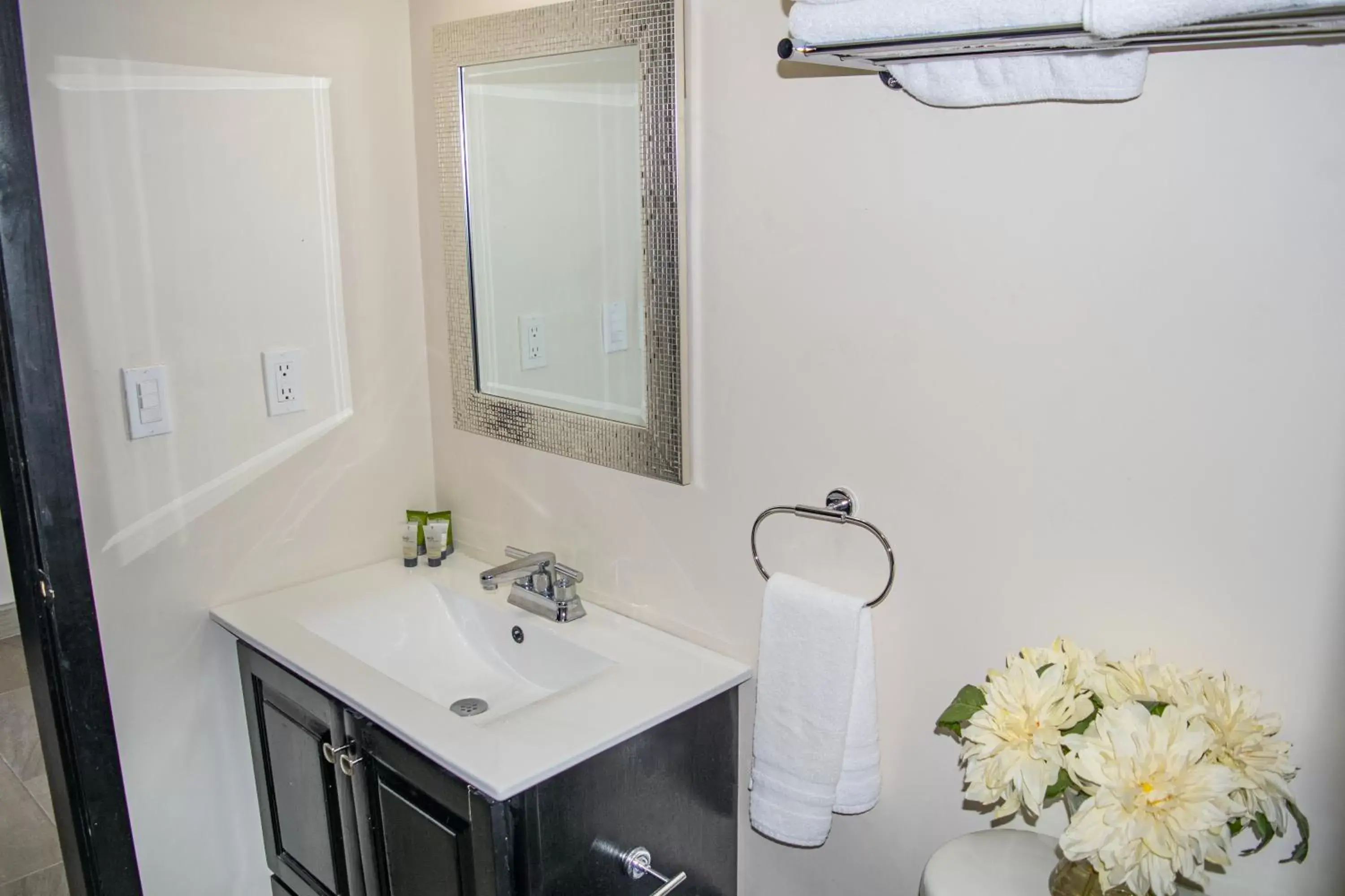 Bathroom in Playas Hotel Suites