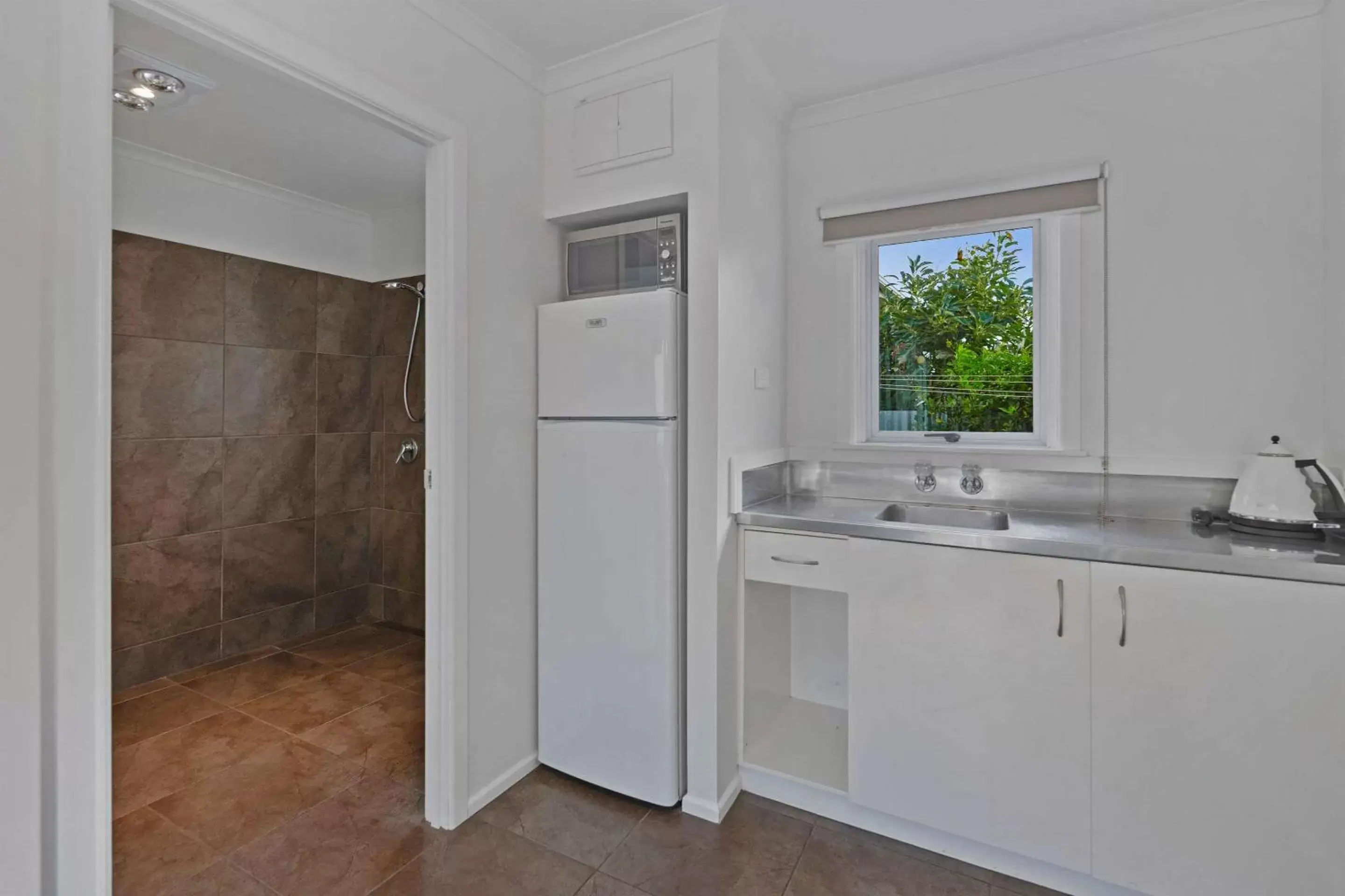 Photo of the whole room, Bathroom in Comfort Inn Westshore Beach