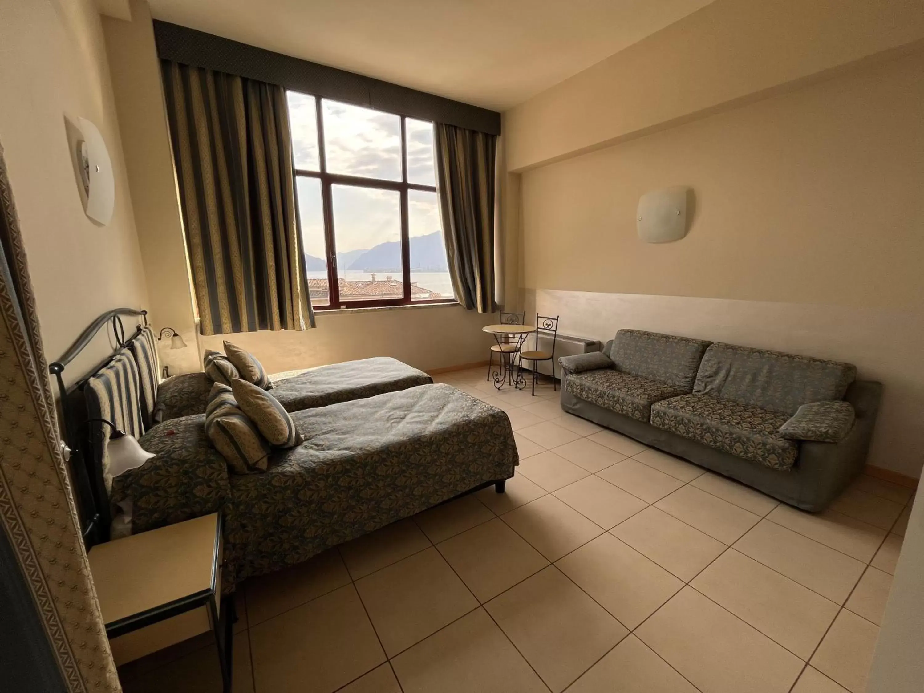 Bed in Hotel Lovere Resort & Spa