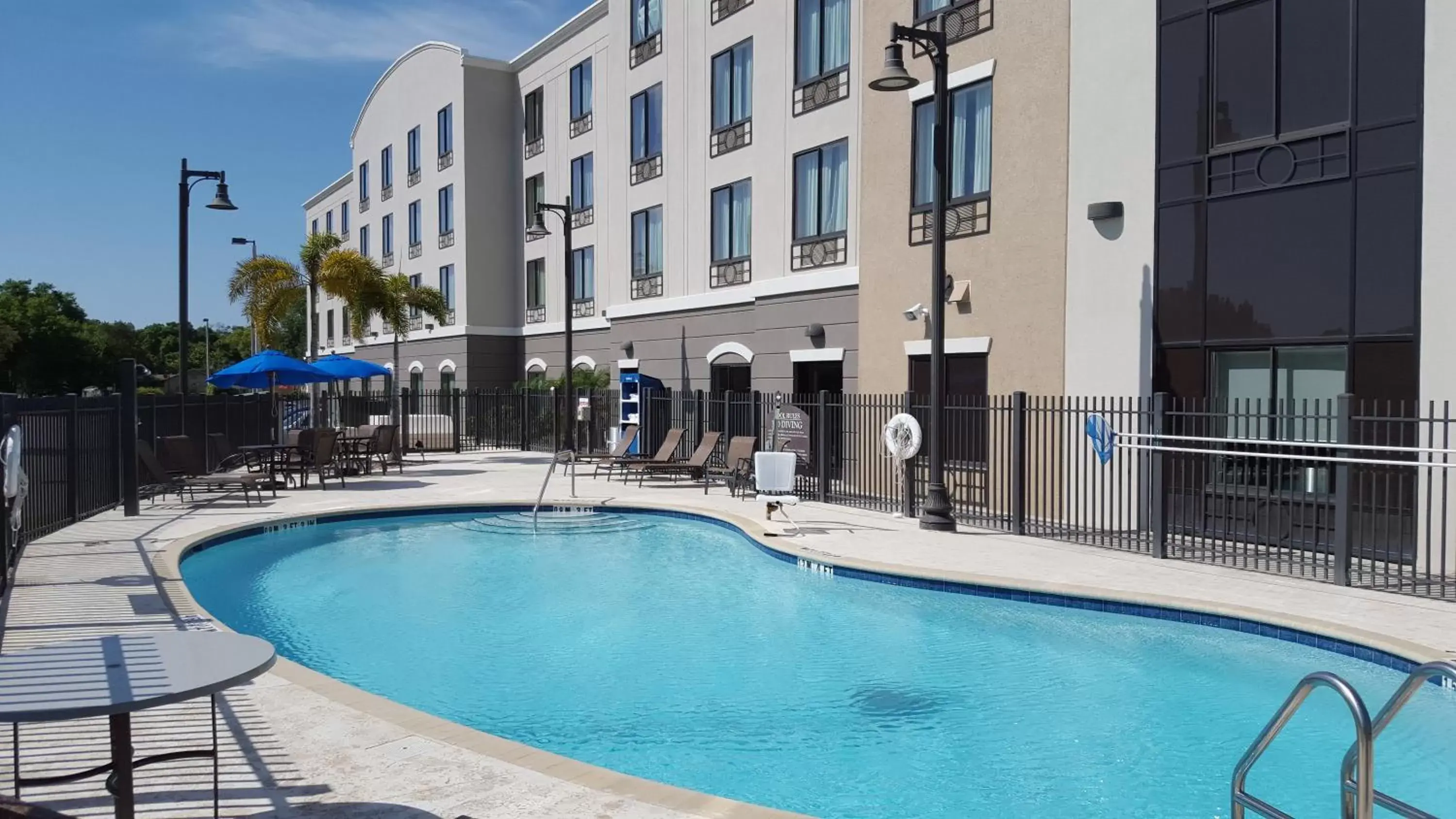 Swimming Pool in Holiday Inn Express Hotel & Suites Tampa-USF-Busch Gardens, an IHG Hotel