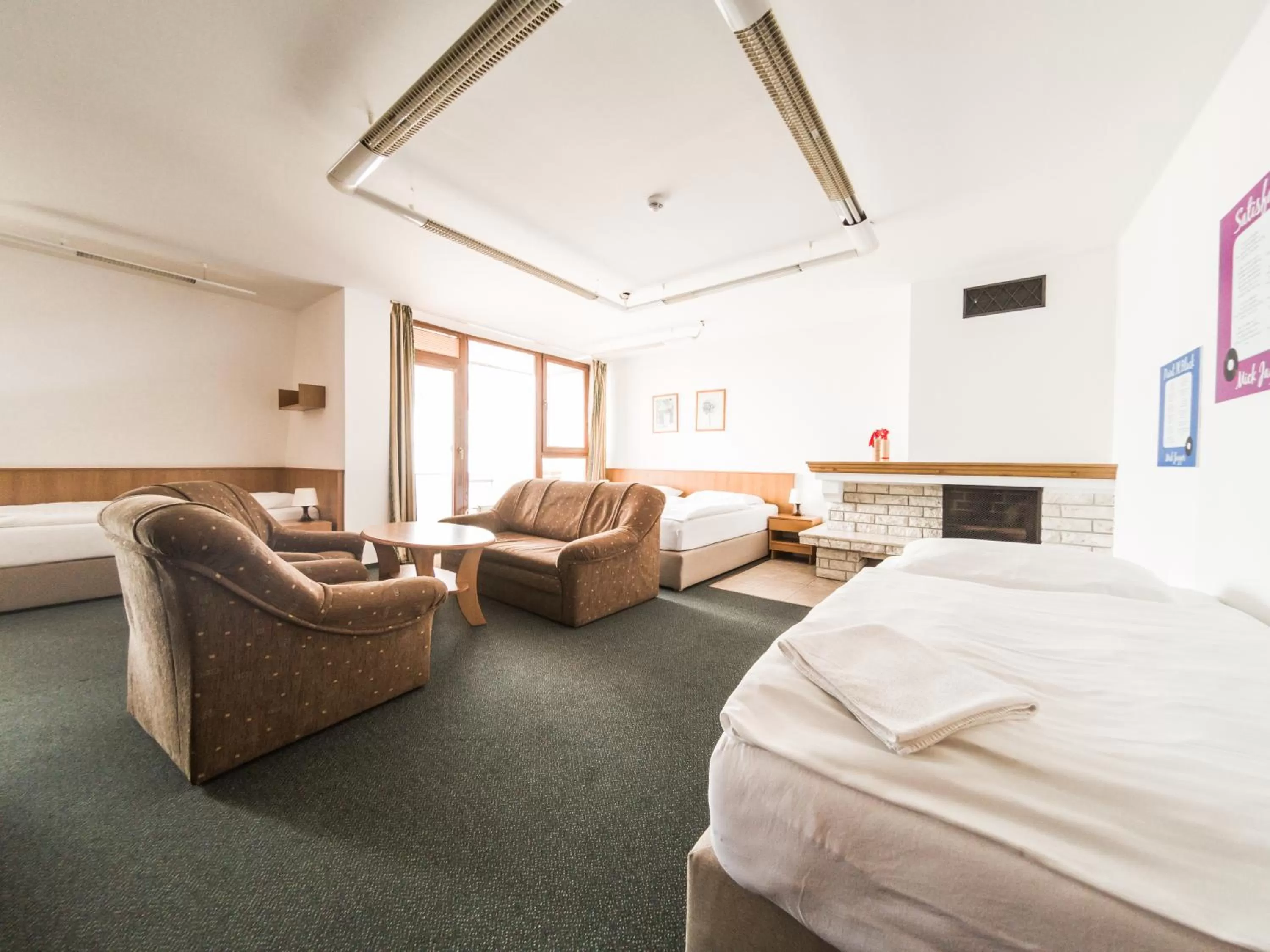 Living room, Bed in Penzion Atlas