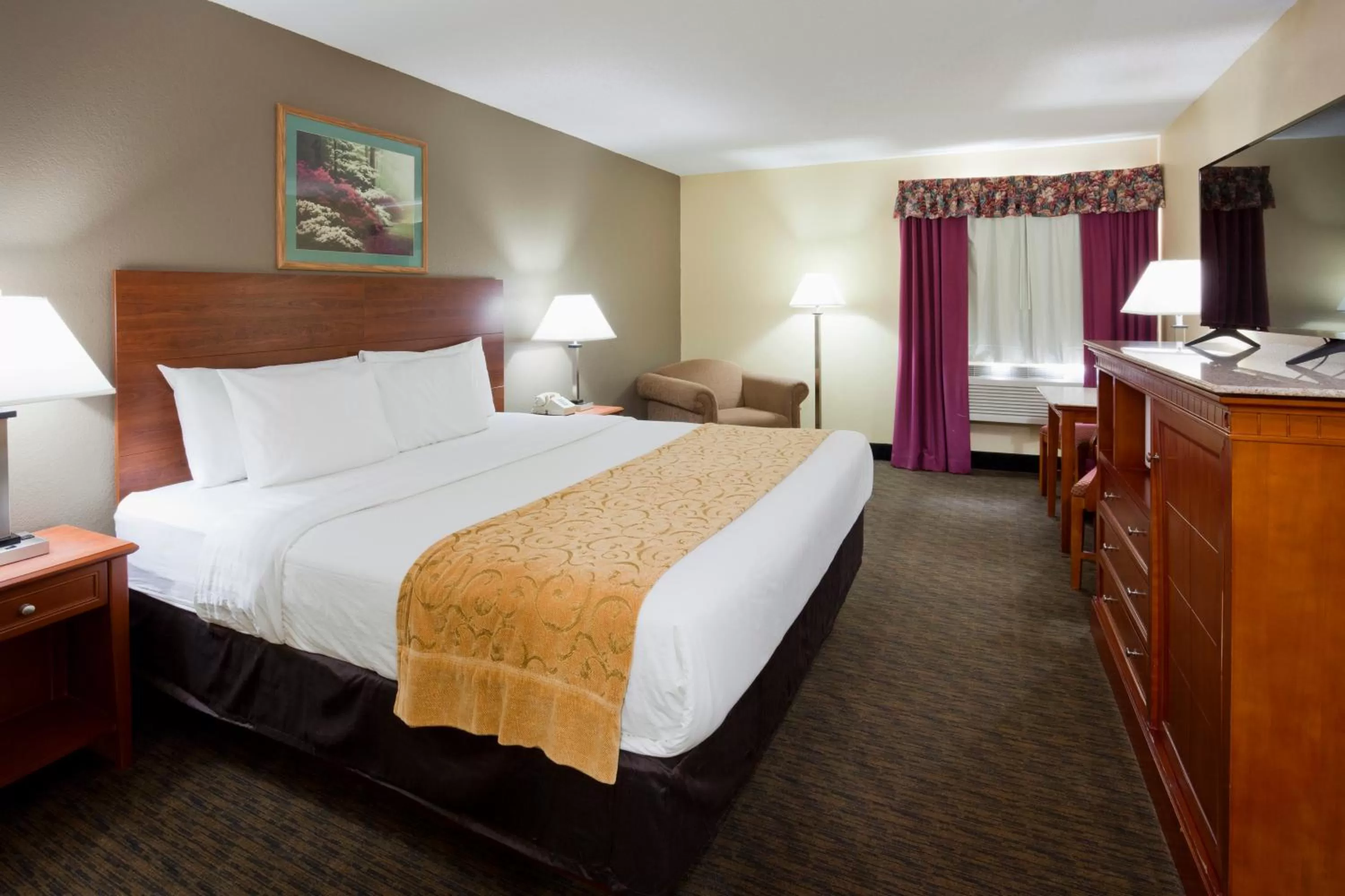 Bedroom, Bed in GrandStay Hotel and Suite Waseca