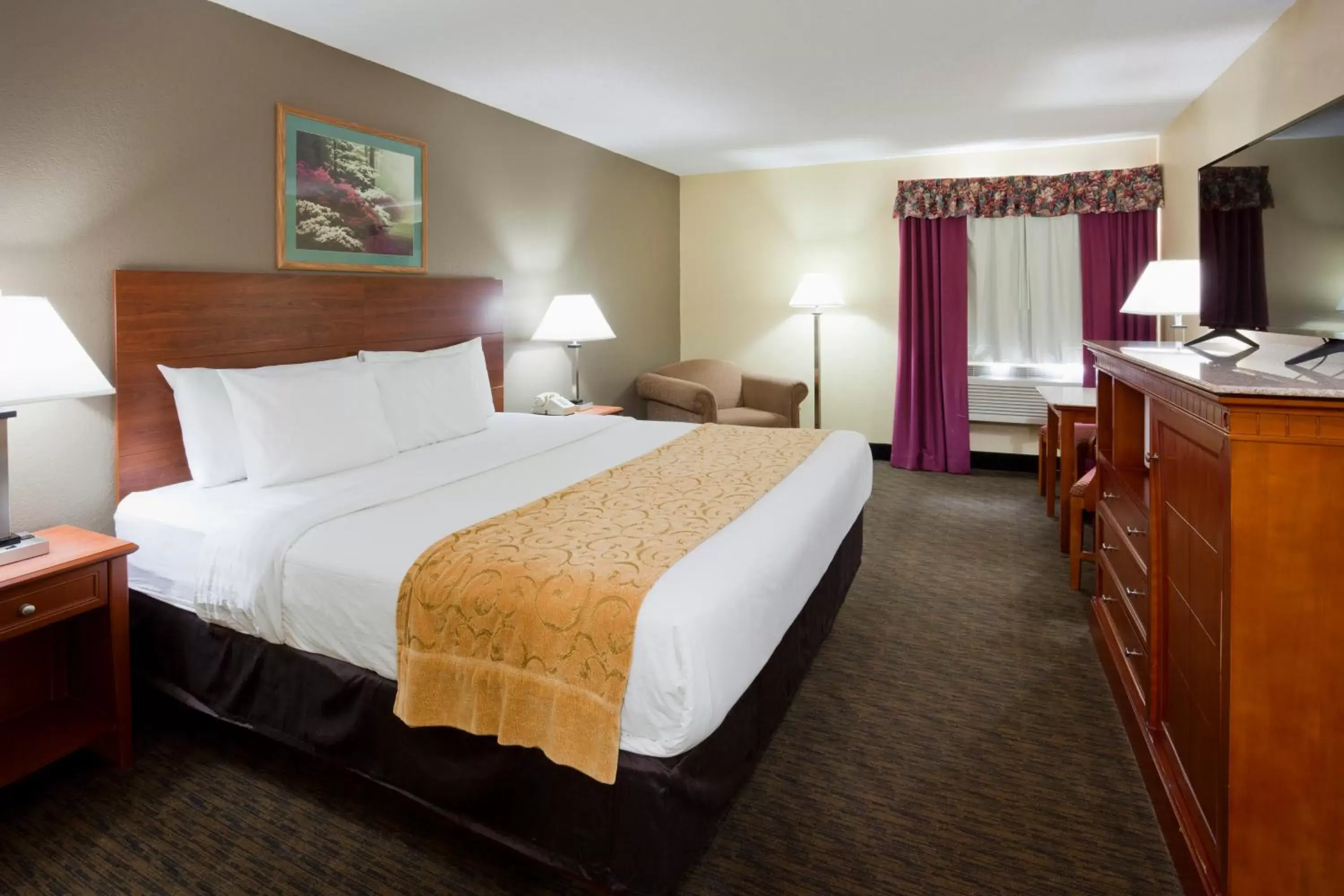 Bed in GrandStay Hotel and Suite Waseca