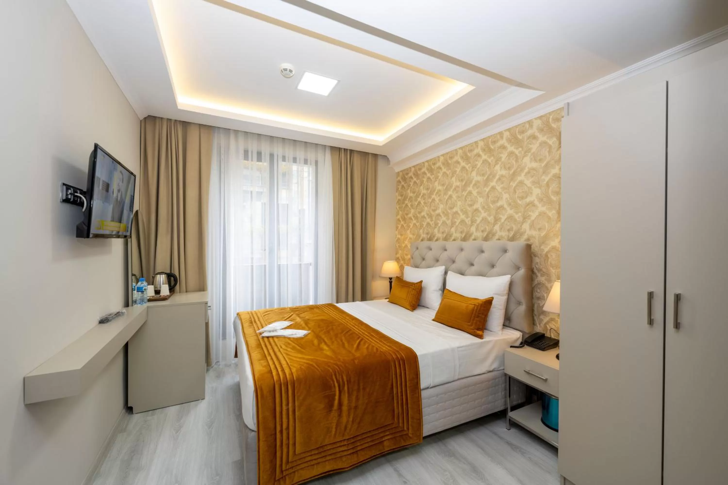 Bed in SKYSTAR DELUXE HOTEL