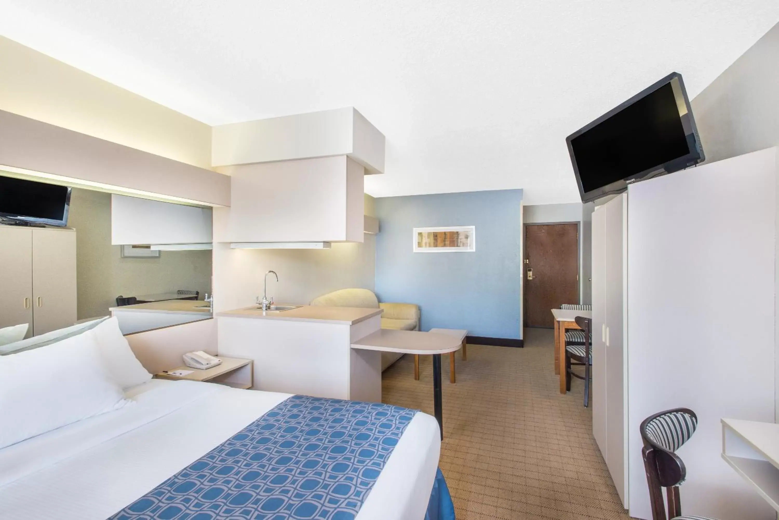 Bed, TV/Entertainment Center in Microtel Inn & Suites by Wyndham