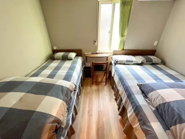 Bed in SHINJUKU WARM HOUSE