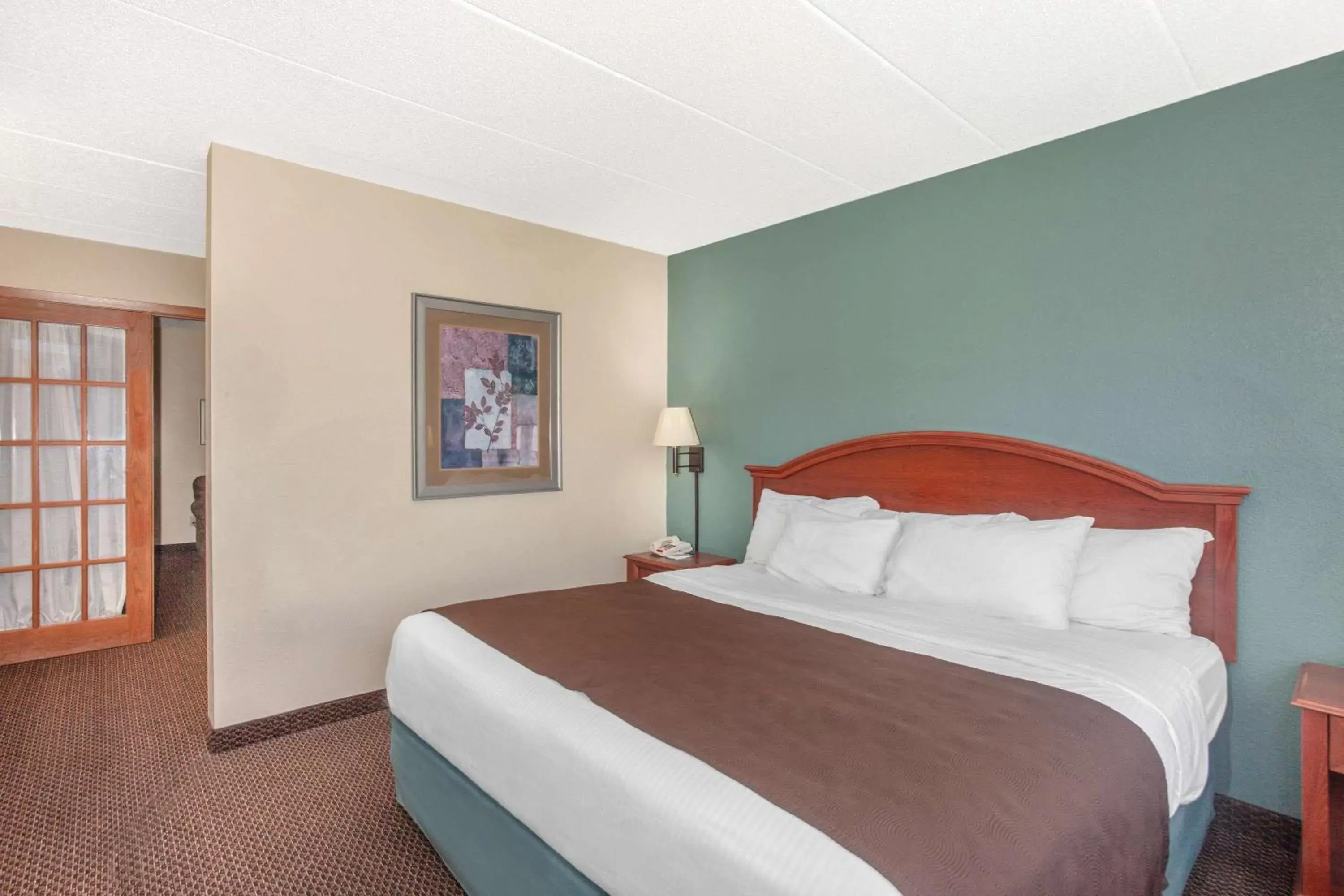 Photo of the whole room, Bed in AmericInn by Wyndham St. Peter