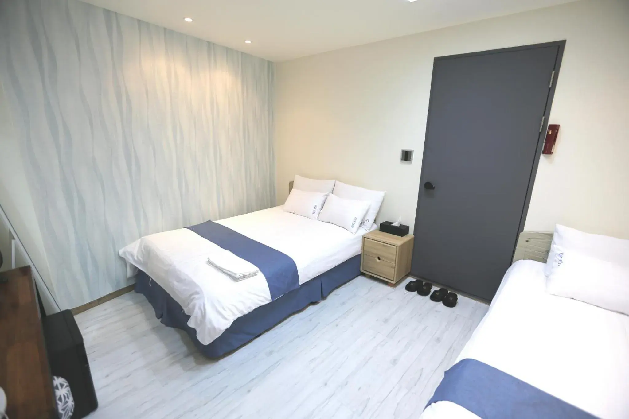 Bed in MUST STAY HOTEL Myeongdong