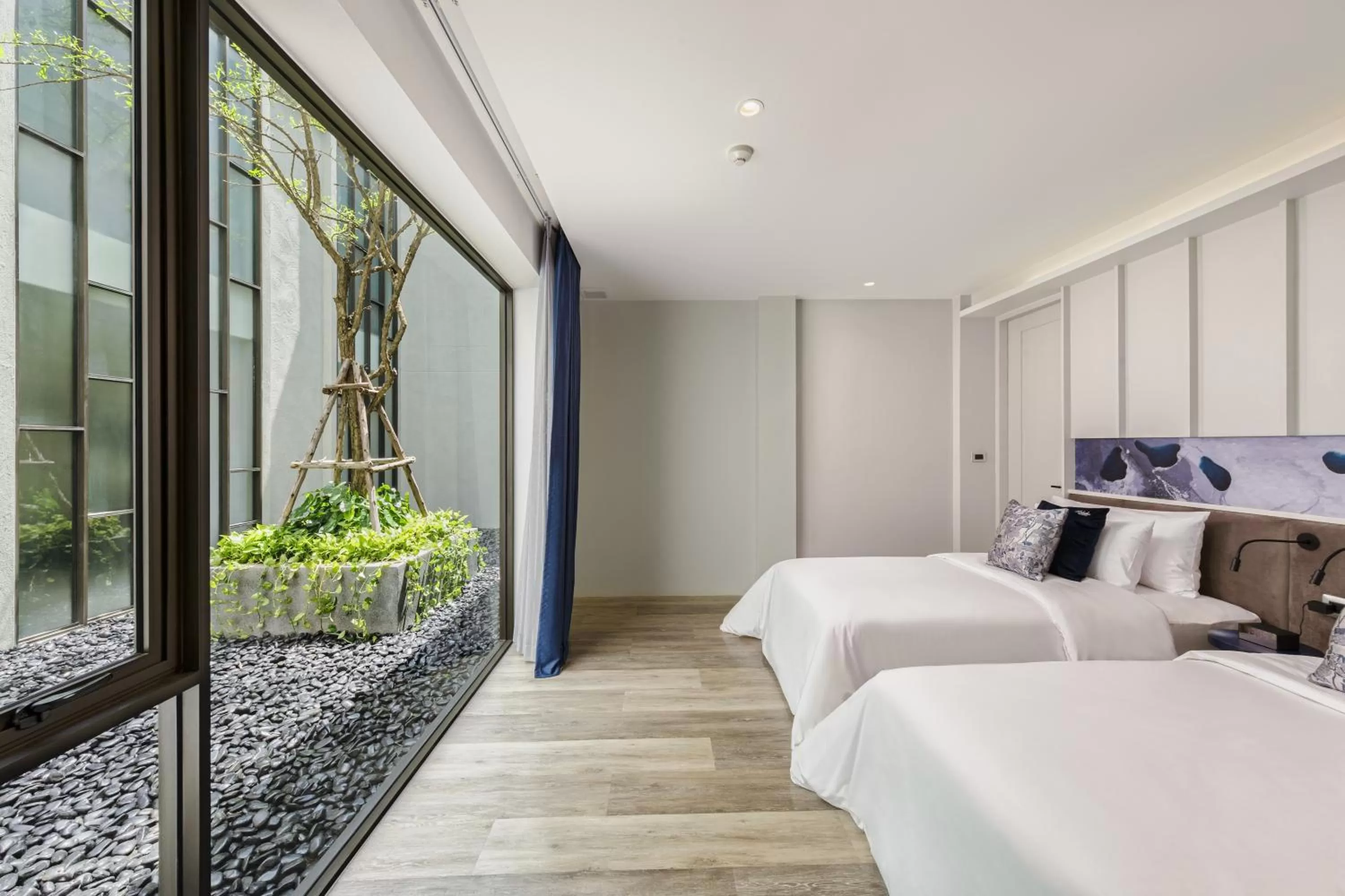 Decorative detail, Bed in Maladee Rendezvous Hotel Chiang Mai