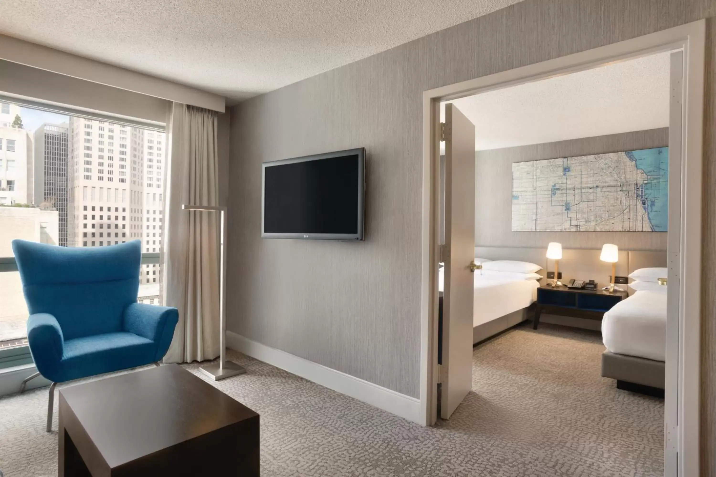 Living room, TV/Entertainment Center in Hilton Chicago Magnificent Mile Suites