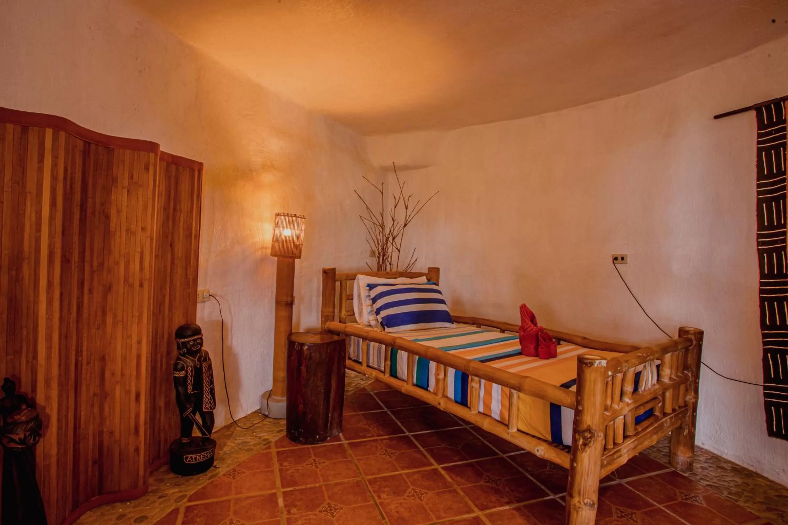 Bed in Atremaru Jungle Retreat