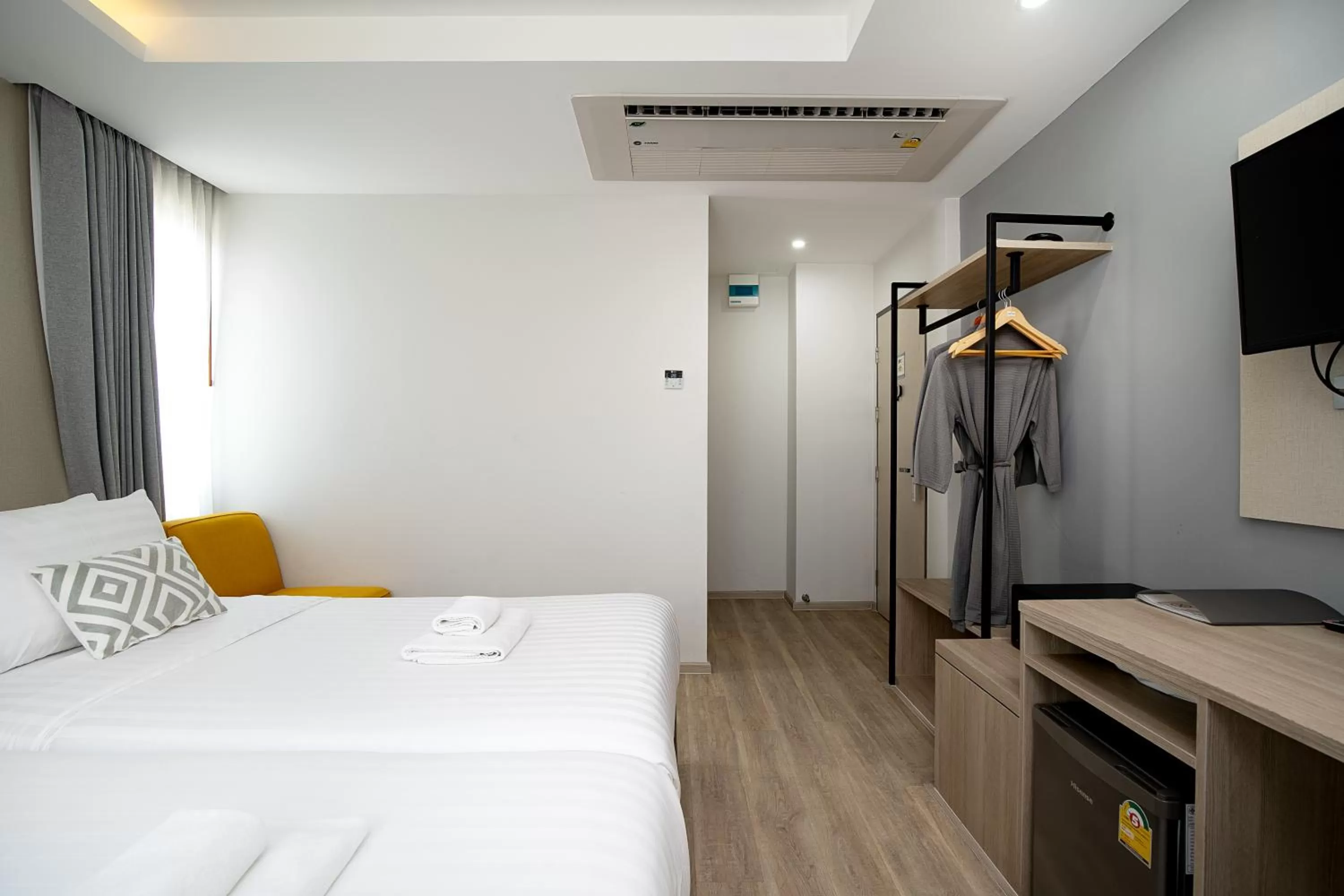 Bed in The Riski Hotel at Bangphlat Station SHA