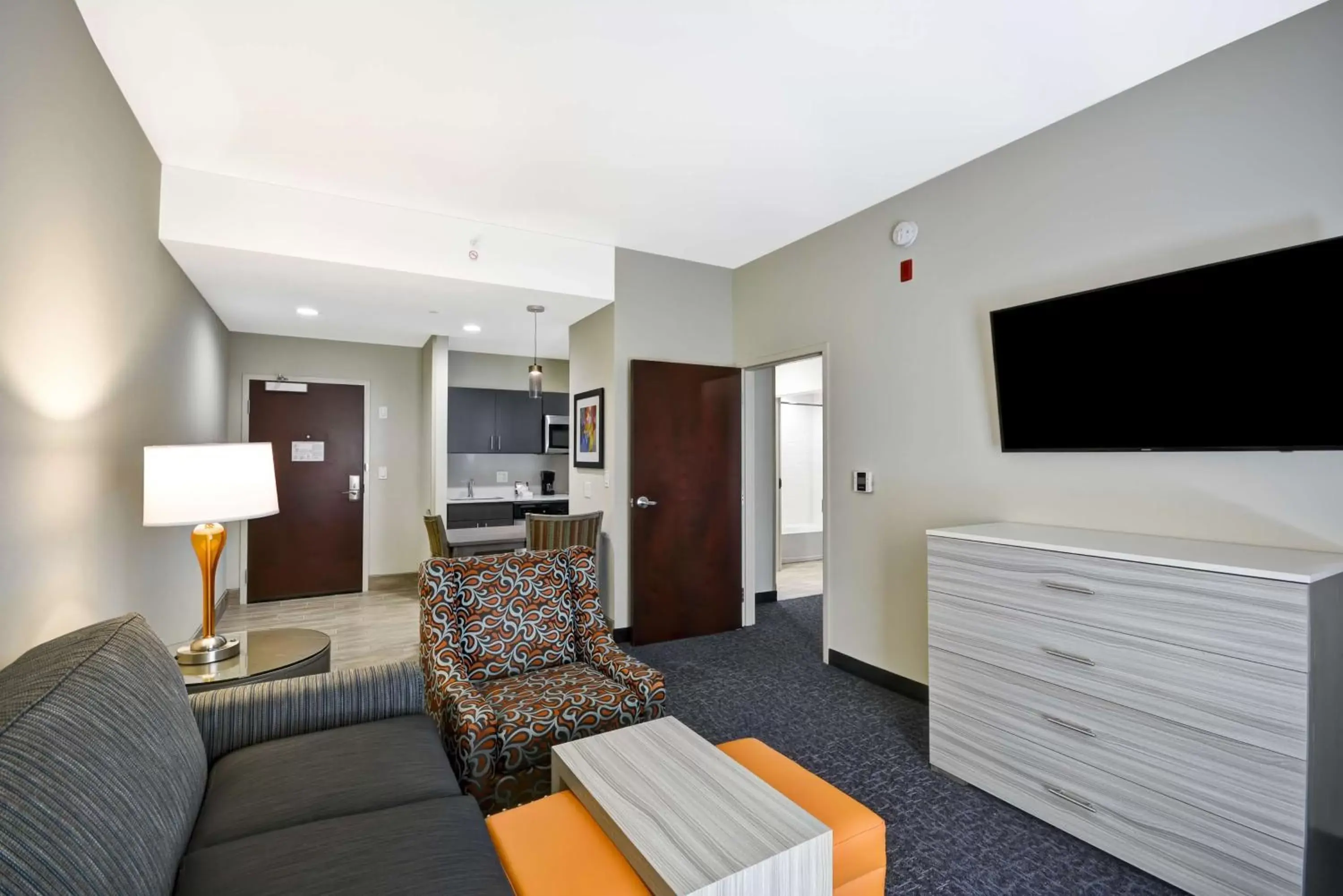 Living room, Seating Area in Homewood Suites by Hilton Orlando Theme Parks