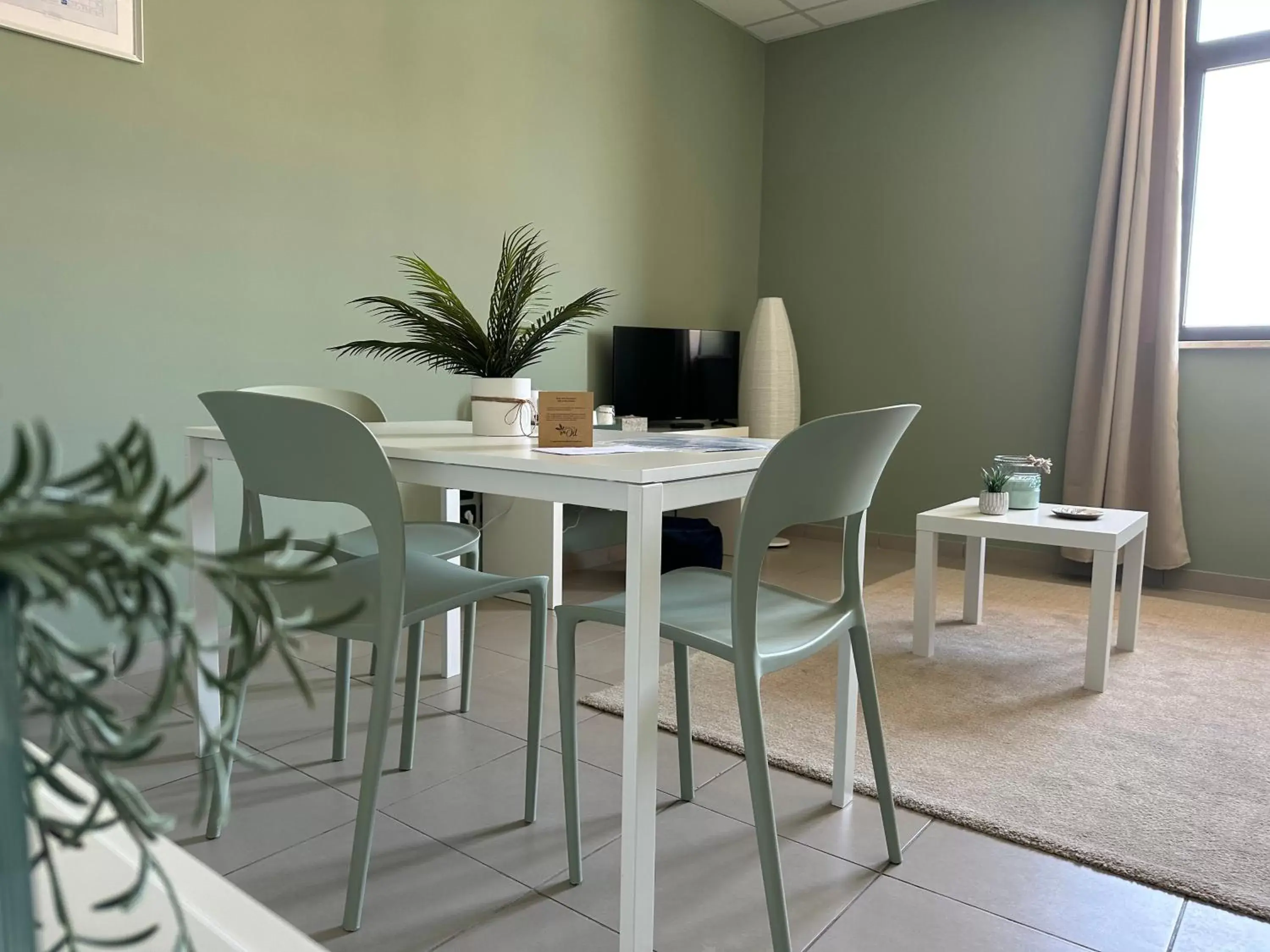 Living room, Dining Area in BOTANICAL SUITE