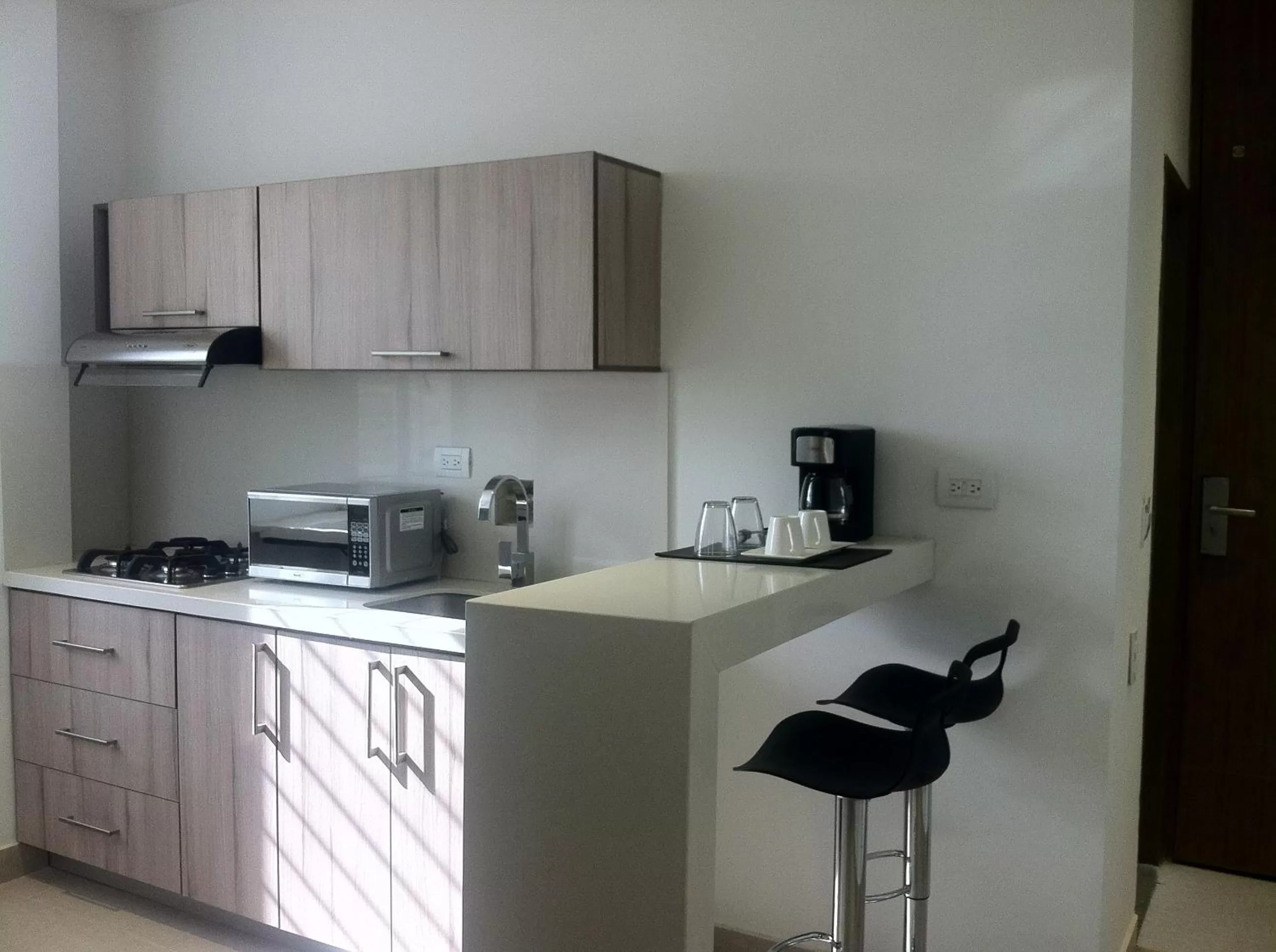Kitchen or kitchenette in Hausen Hotel - Suites