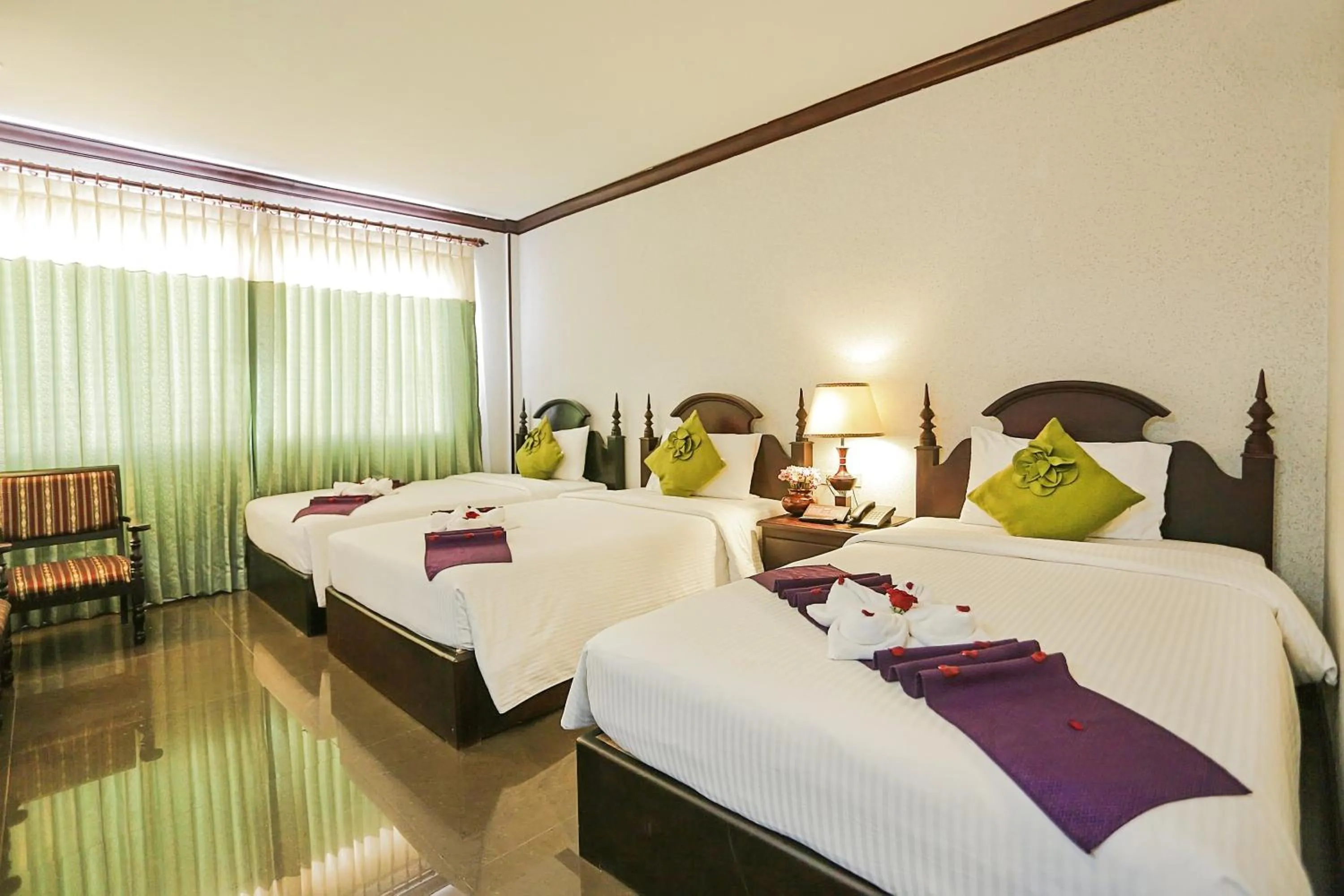 Bed in Lucky Angkor Hotel & Spa