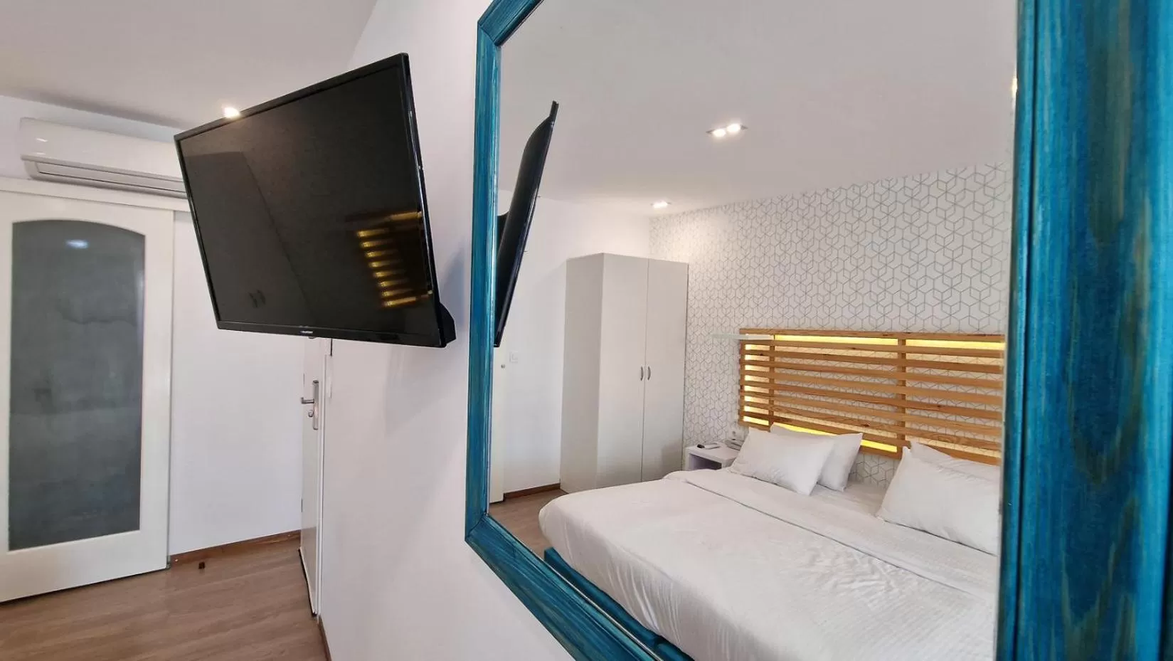 Bed in Athenian Montaza Hotel