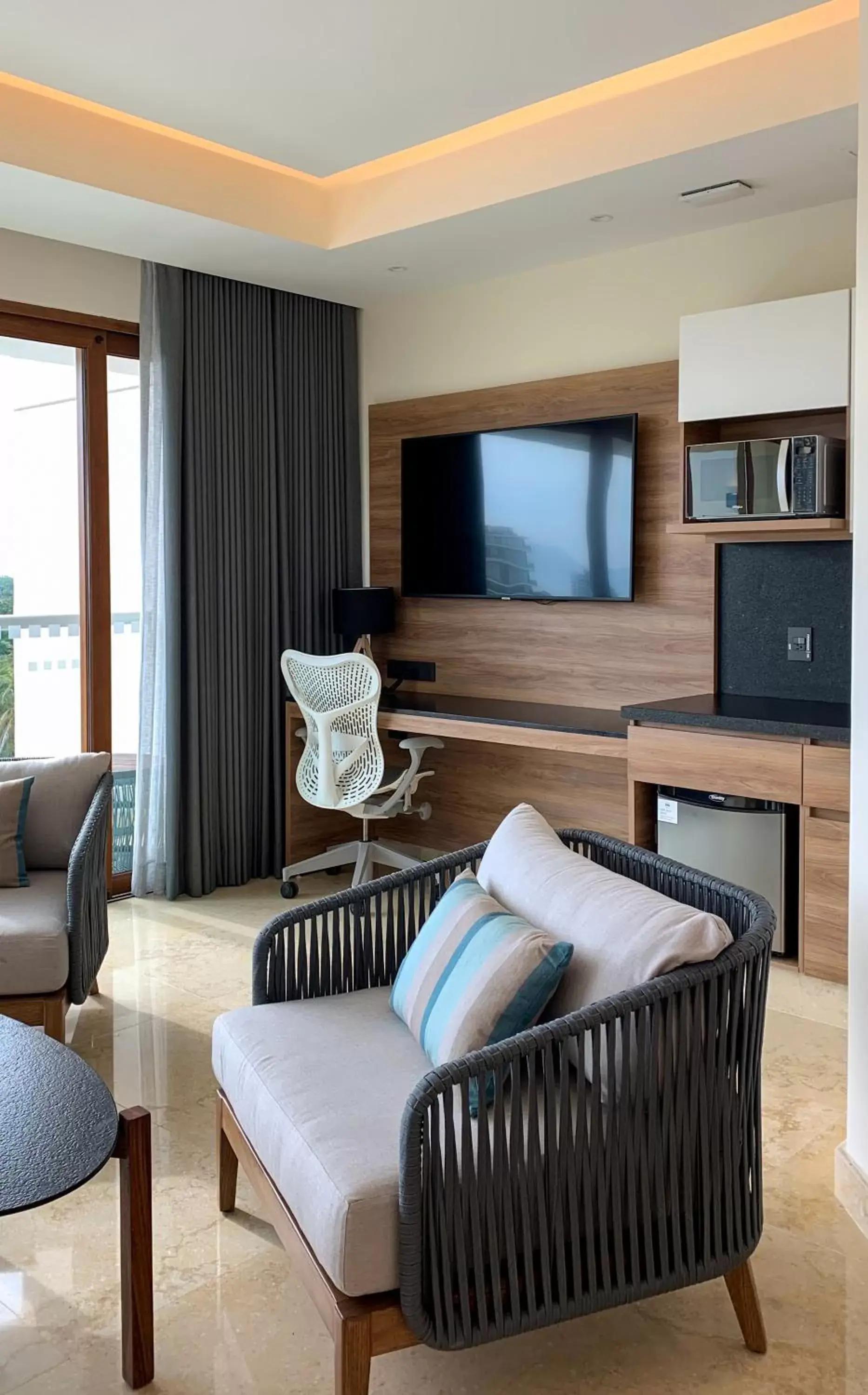 TV and multimedia, Seating Area in Holiday Inn & Suites - Puerto Vallarta Marina & Golf, an IHG Hotel