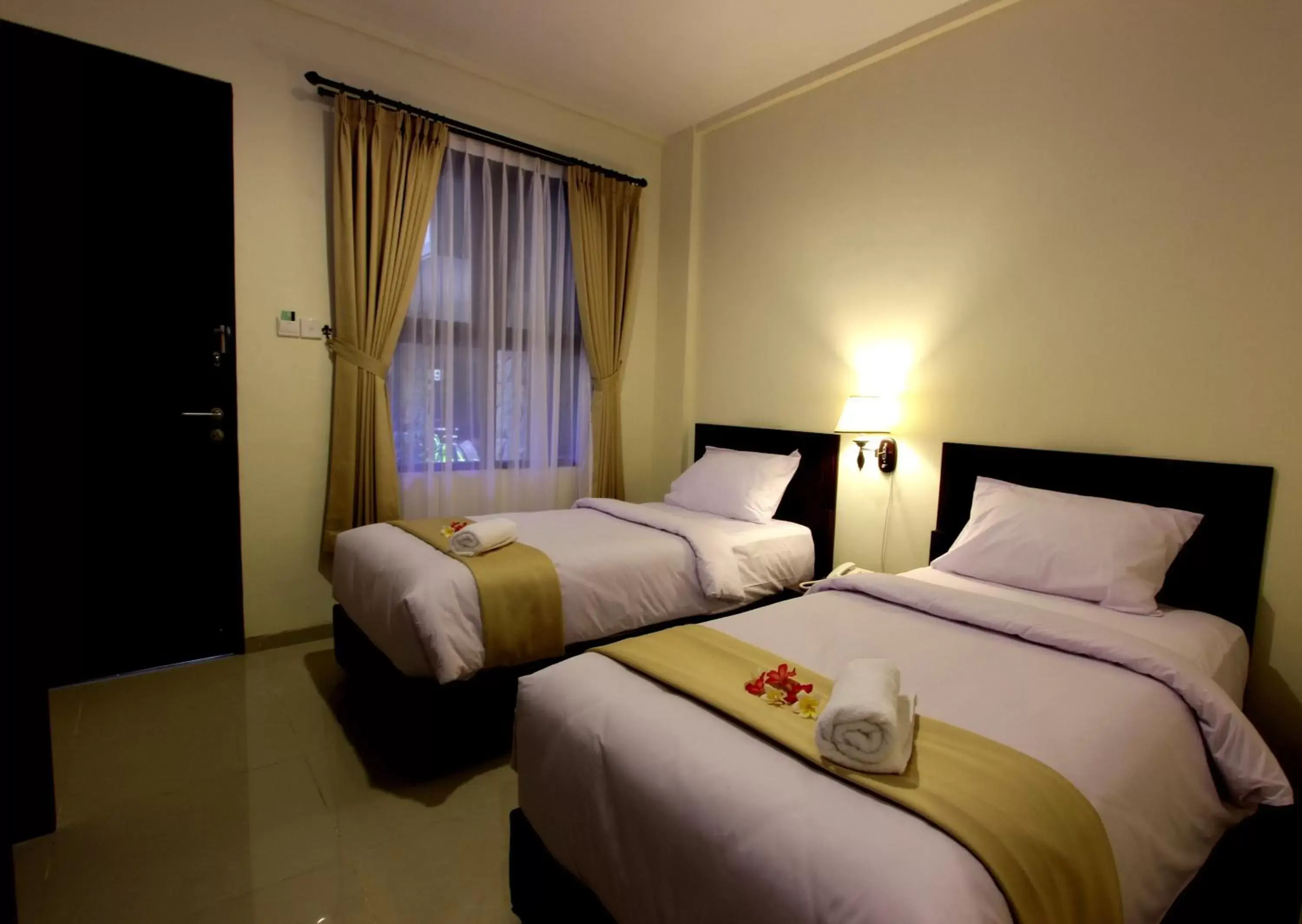 Bedroom, Bed in Manggar Indonesia Hotel