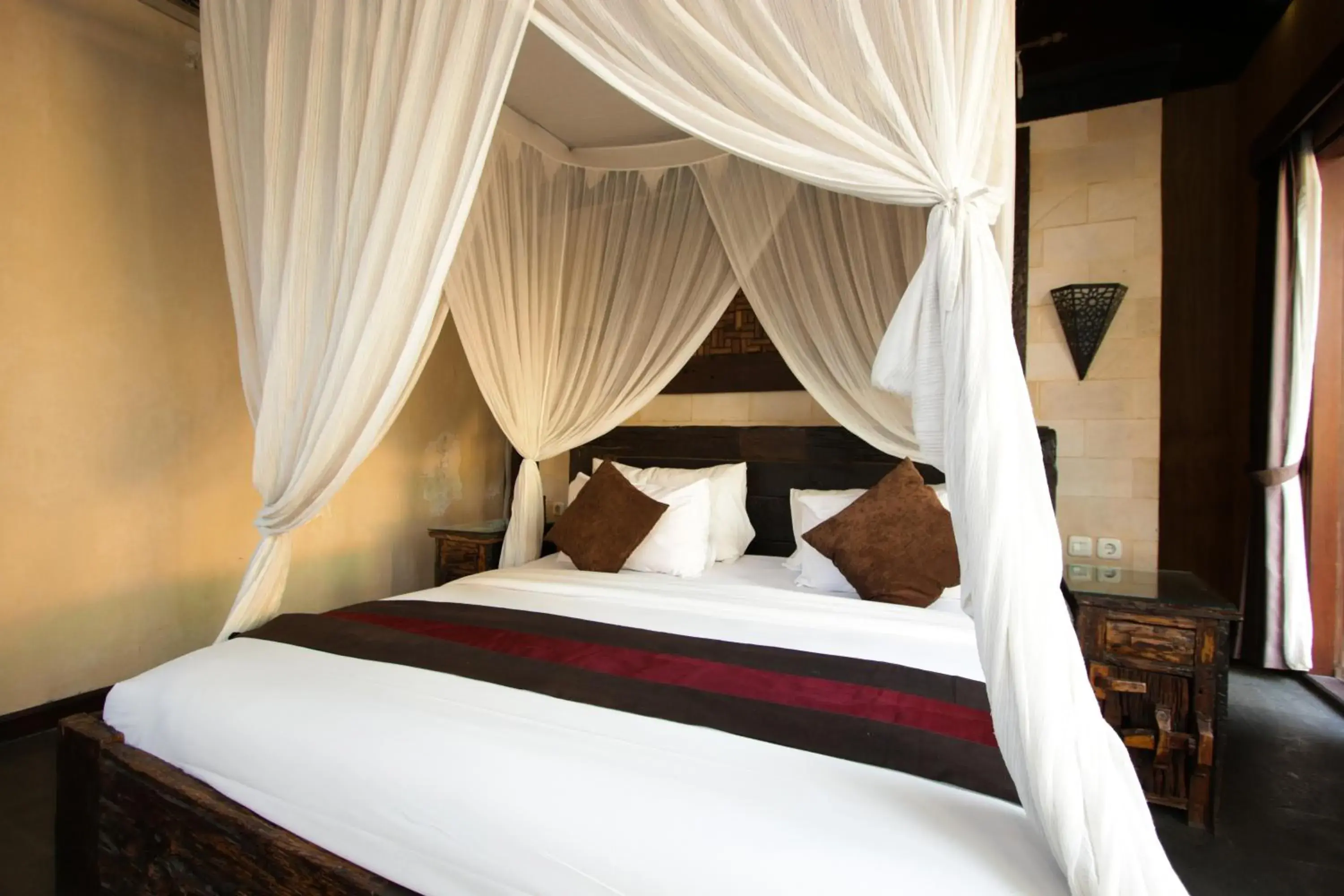 Bed in Gino Feruci Villa Ubud by KAGUM Hotels