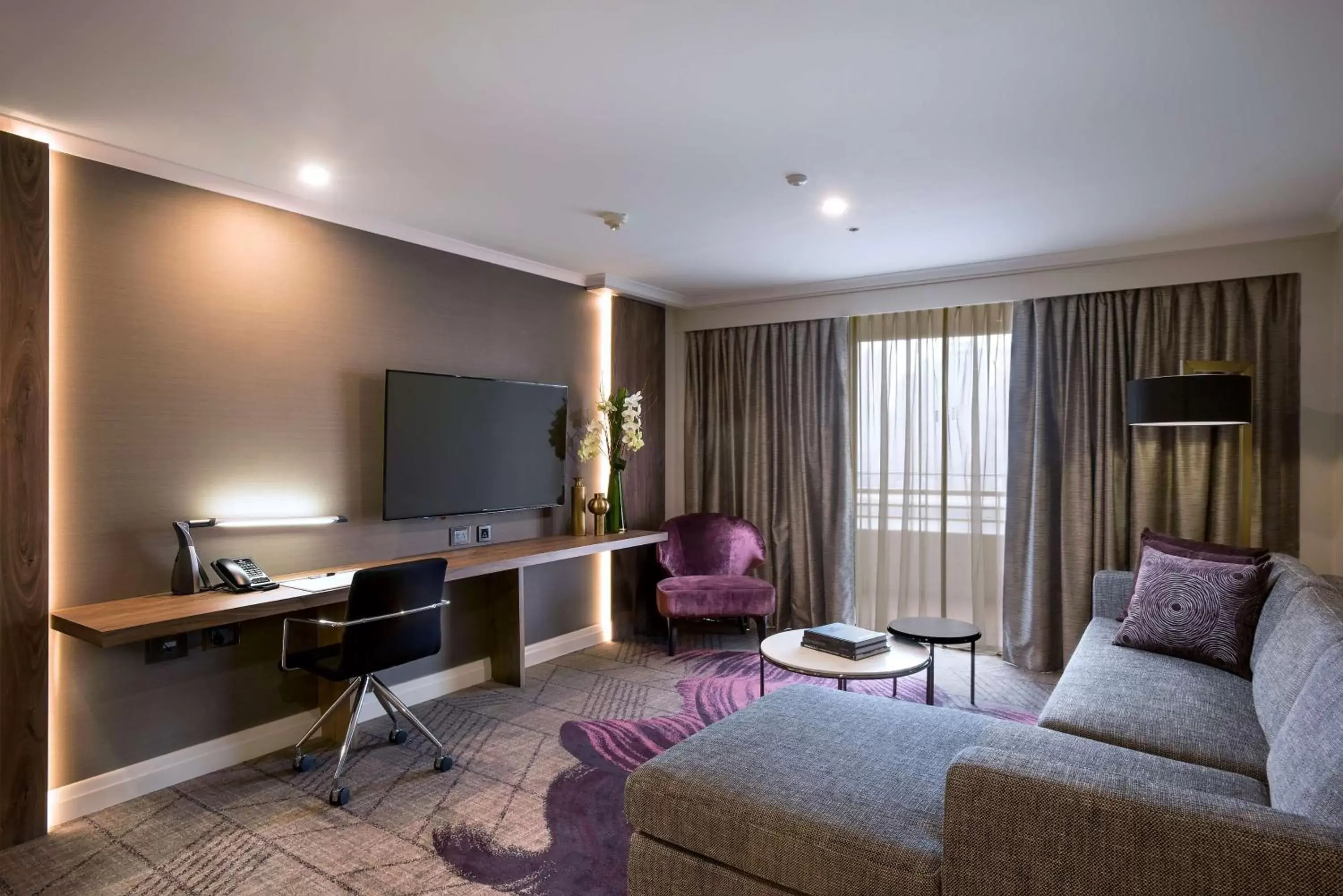 Photo of the whole room, TV/Entertainment Center in Rydges South Bank Brisbane