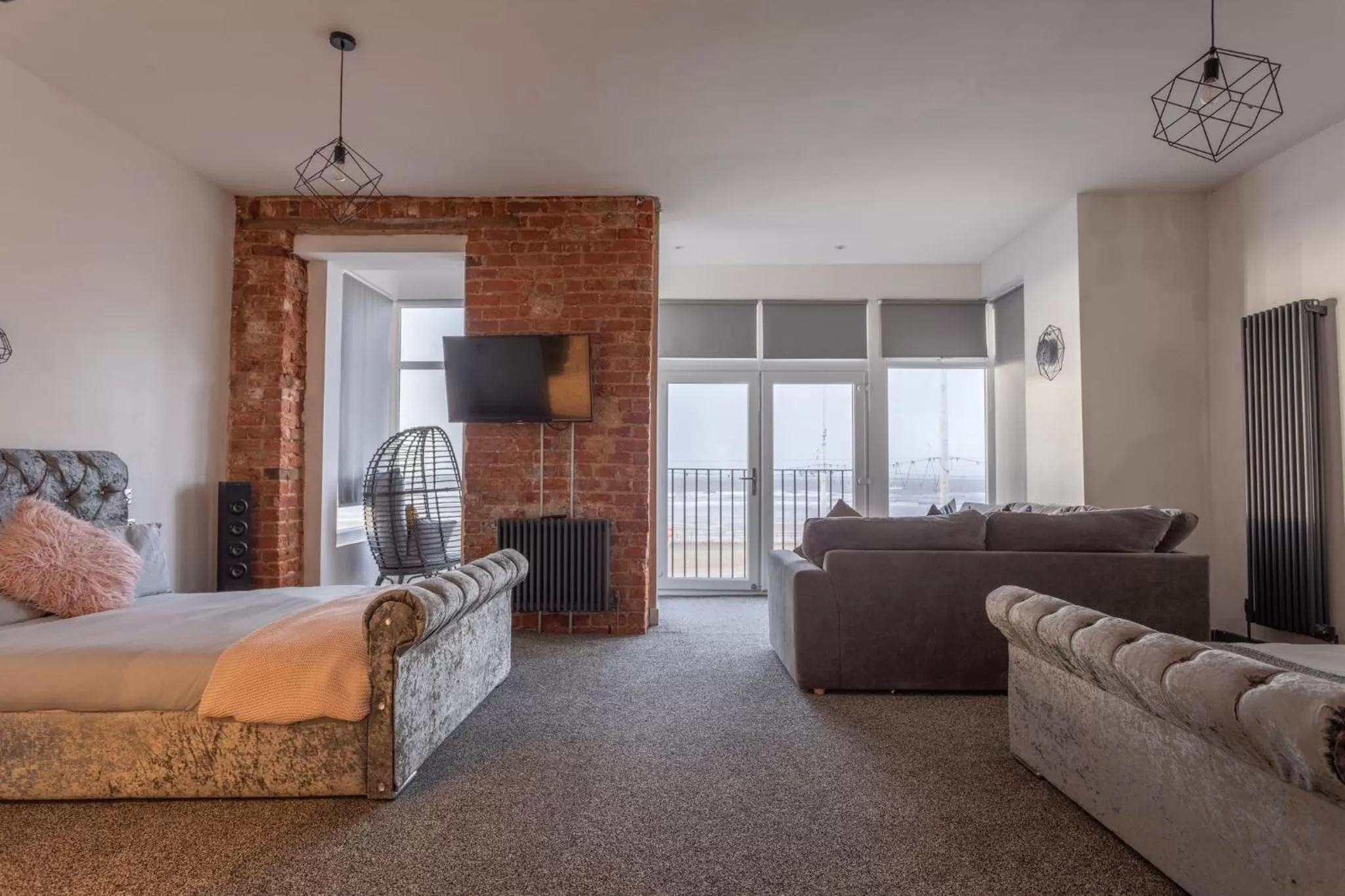 Bed in RESIDENCY LUXURY SEAFRONT HOTEL