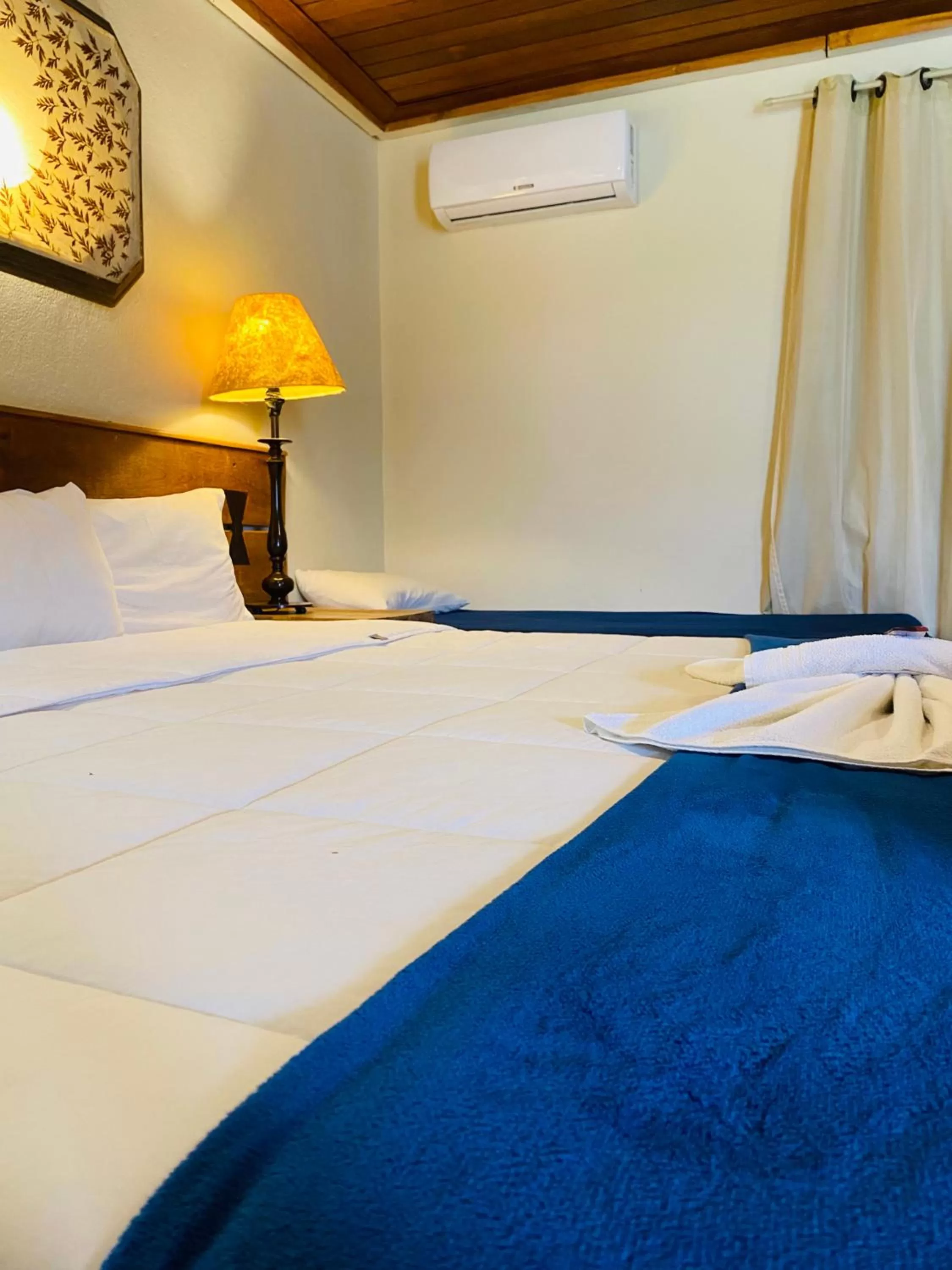 Bed in POUSADA CHARLOTTE