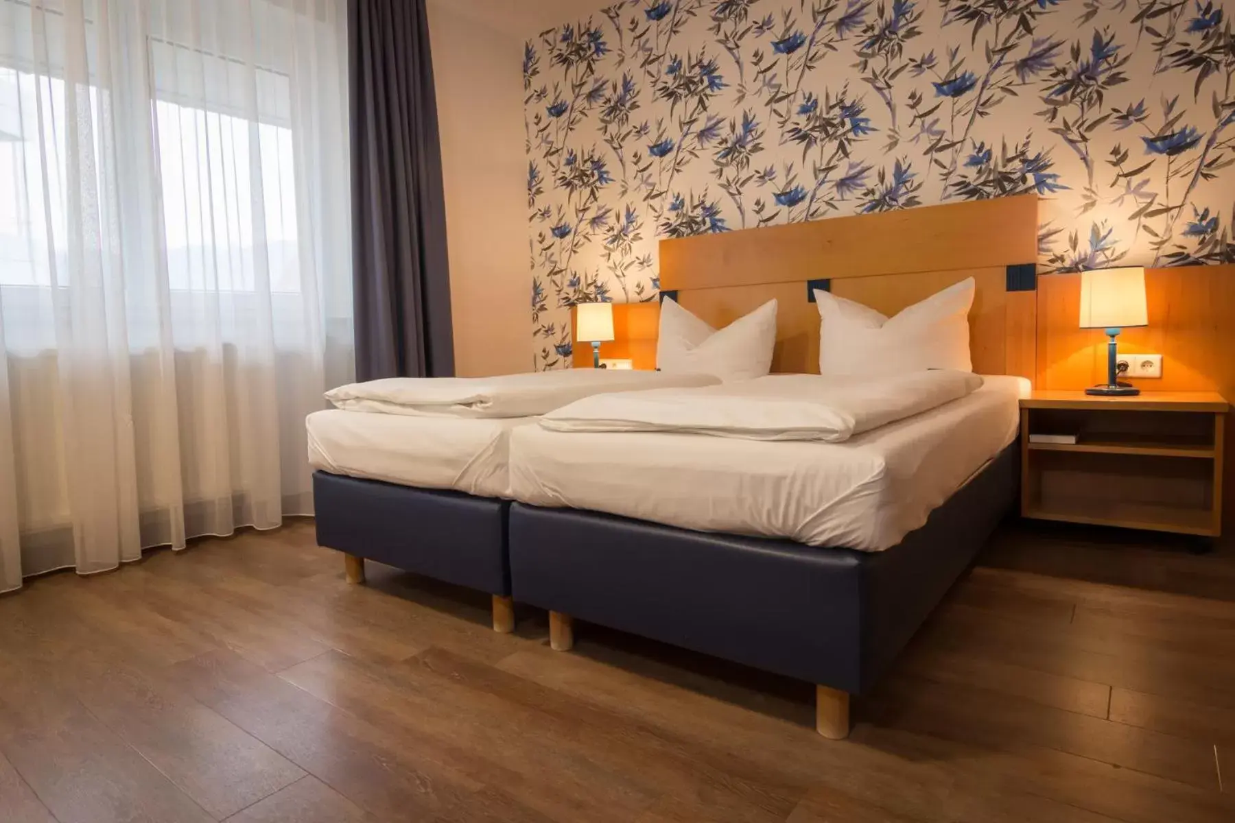 Photo of the whole room, Bed in Seehotel Adler