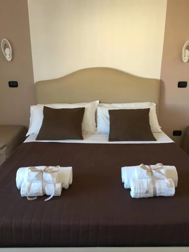 Bed in Maison Arena Bovio