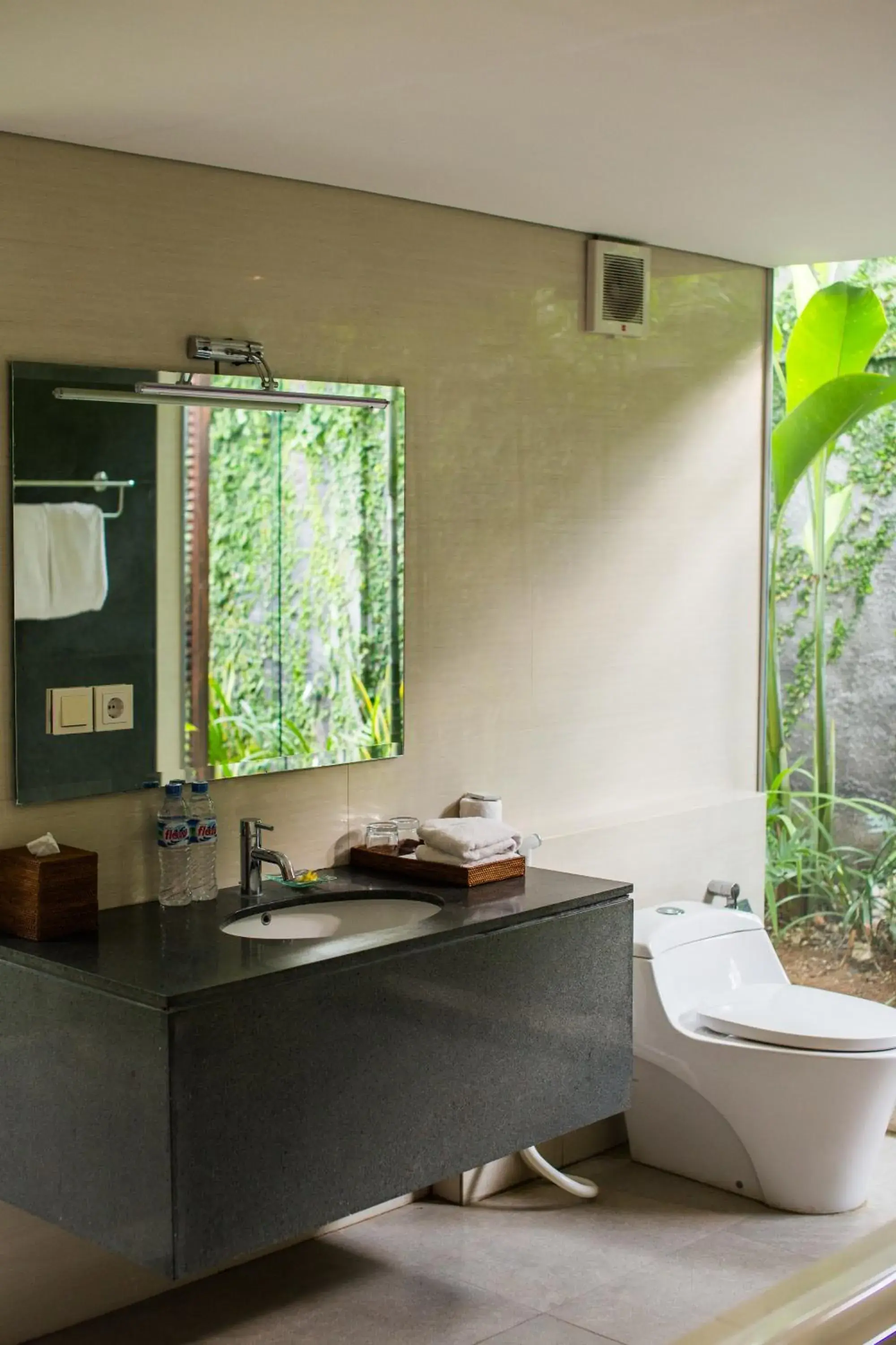 Bathroom, TV/Entertainment Center in The Astari Villa and Residence