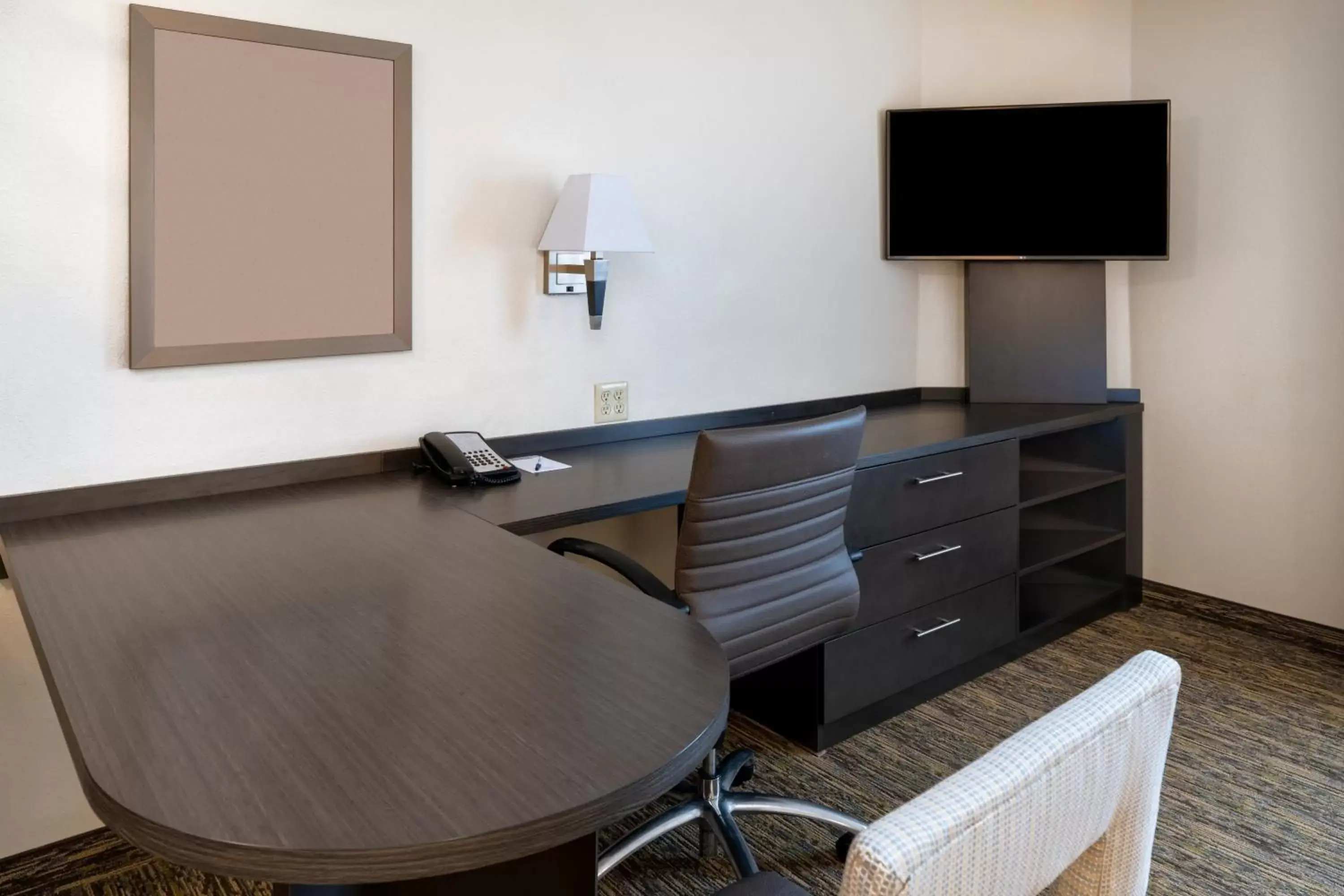 Photo of the whole room, TV/Entertainment Center in Candlewood Suites Washington-Dulles Herndon, an IHG Hotel
