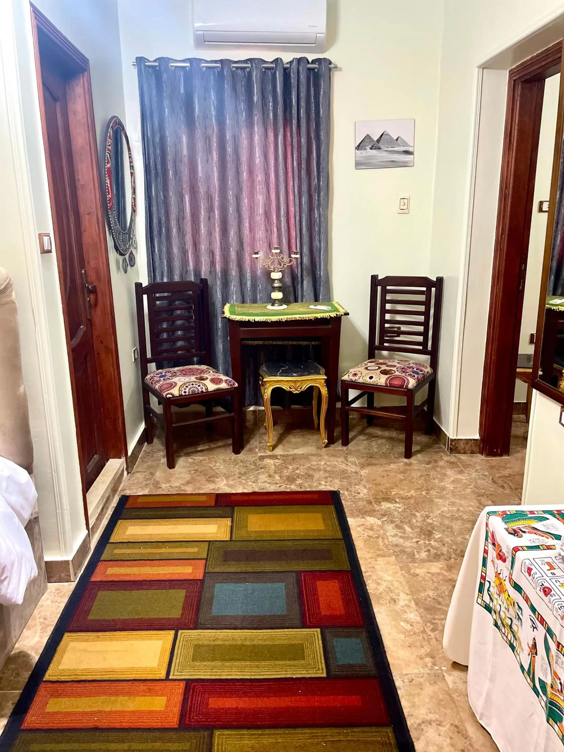 Sphinx palace pyramids view