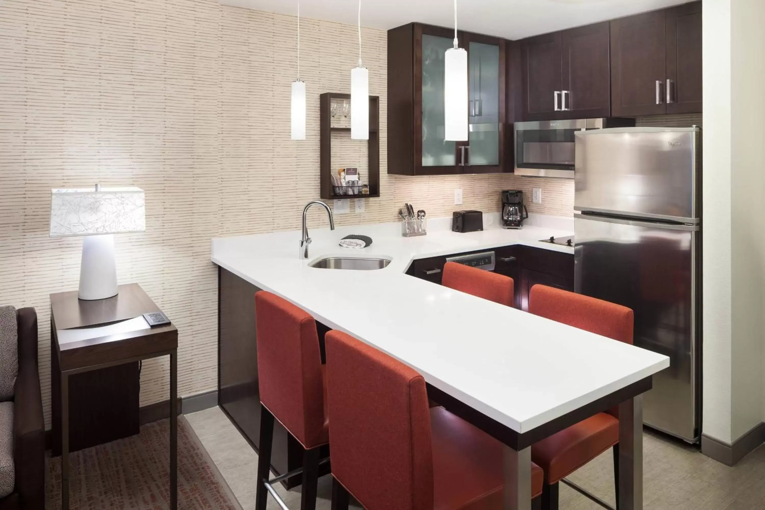 Photo of the whole room, Kitchen/Kitchenette in Residence Inn by Marriott Near Universal Orlando
